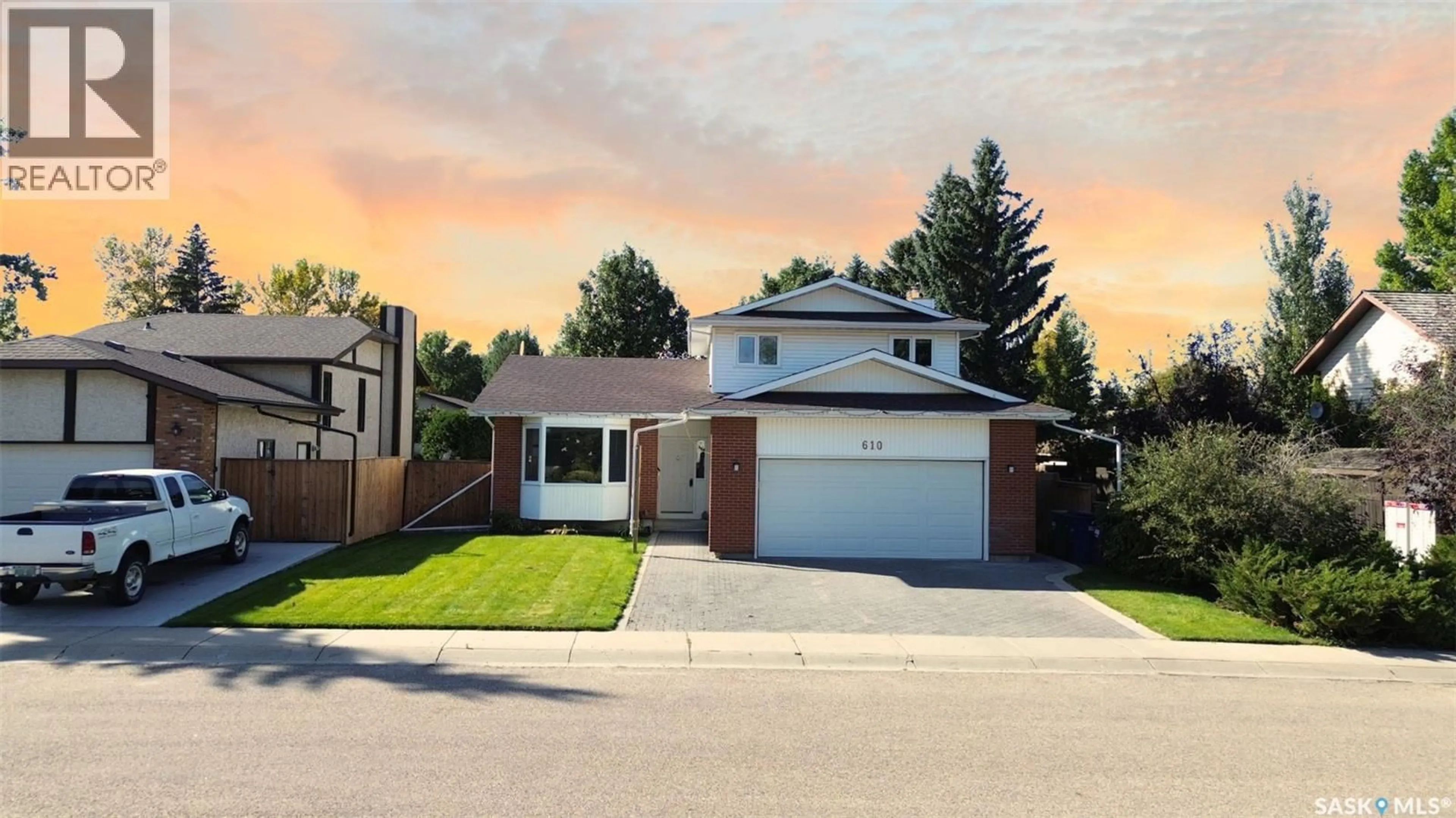 Home with brick exterior material, street for 610 NESSLIN CRESCENT, Saskatoon Saskatchewan S7J4V5