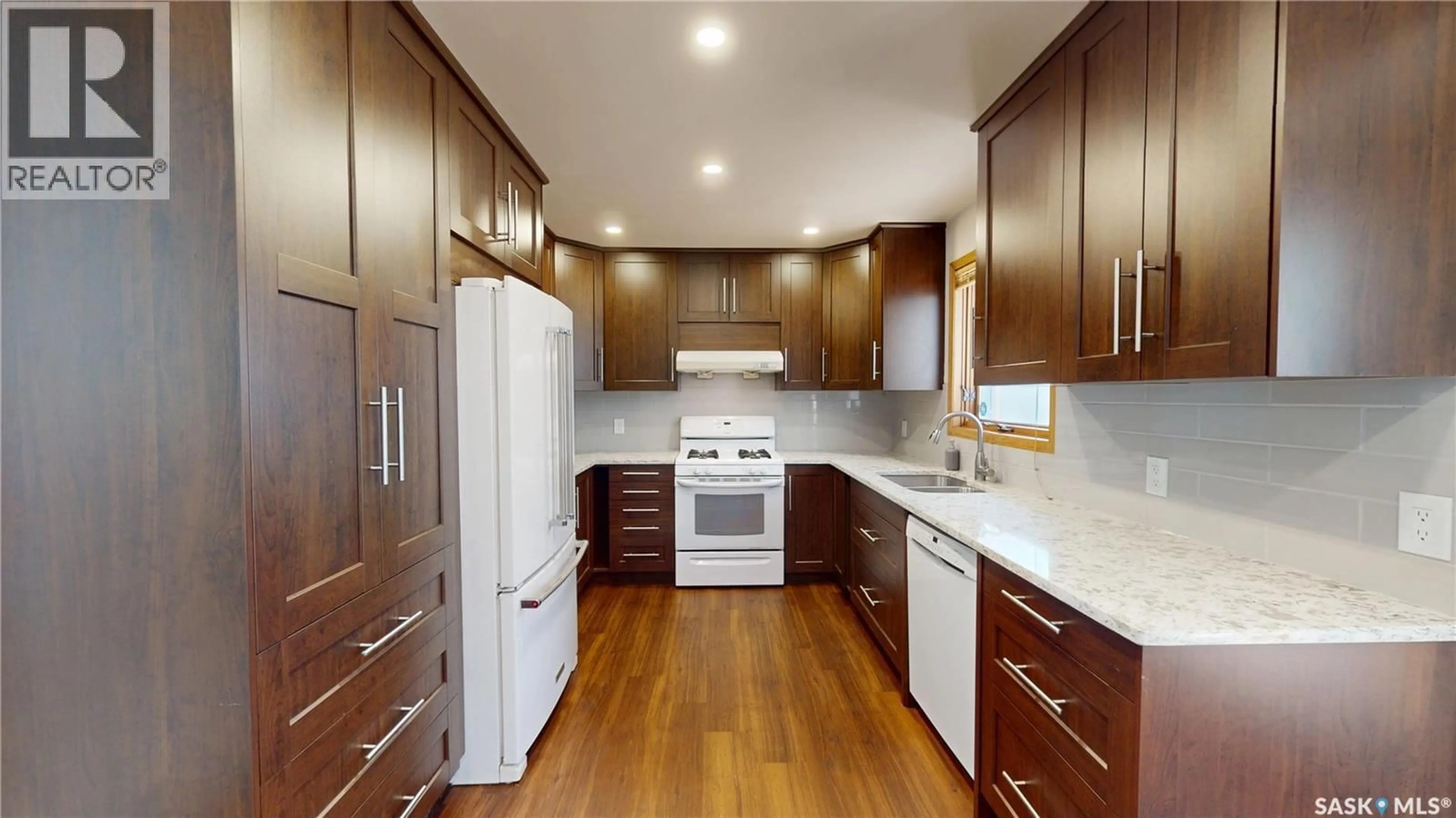 Standard kitchen, wood/laminate floor for 610 NESSLIN CRESCENT, Saskatoon Saskatchewan S7J4V5