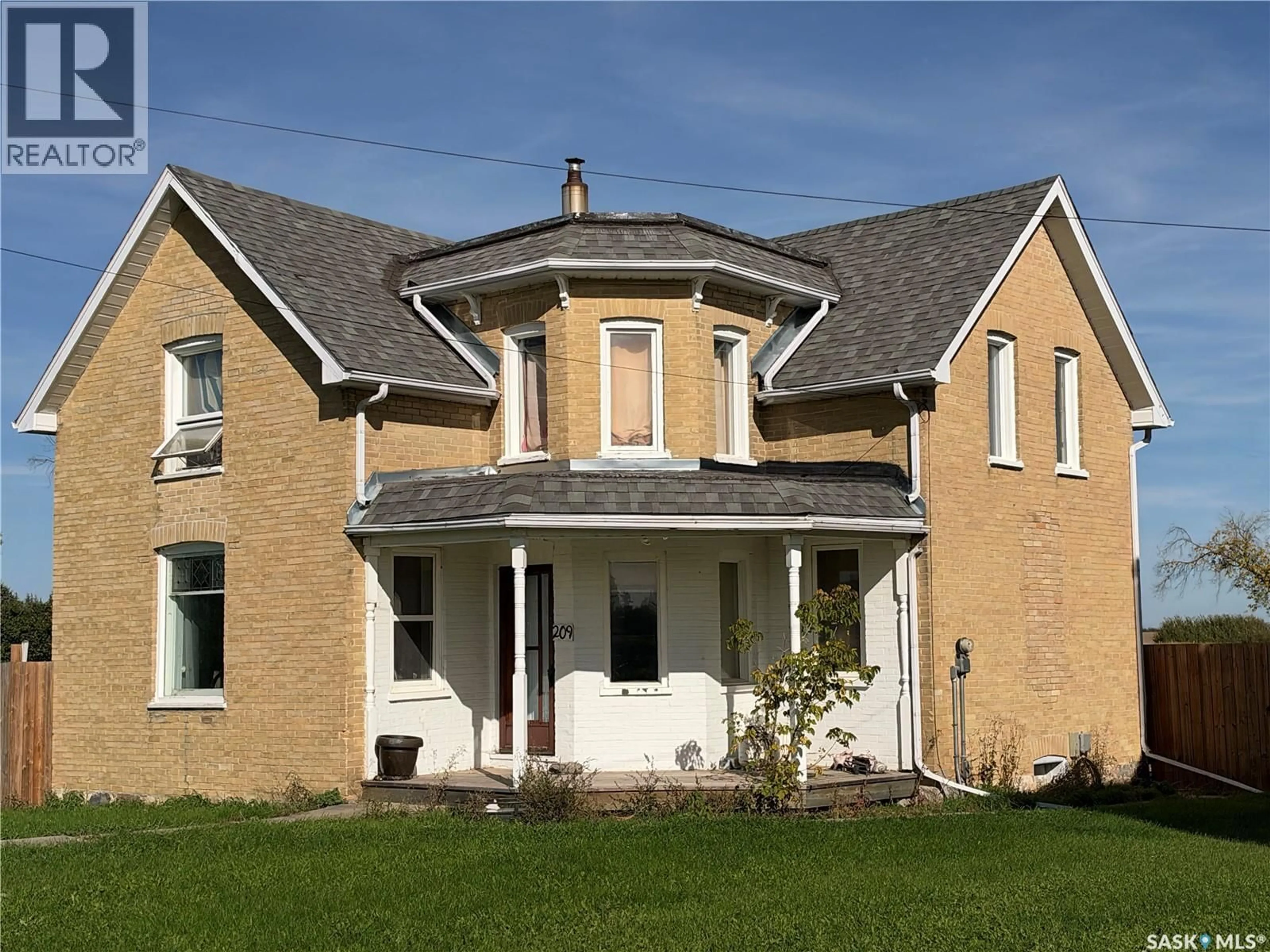 Home with brick exterior material, building for 209 GOVERNMENT ROAD, Wolseley Saskatchewan S0G5H0