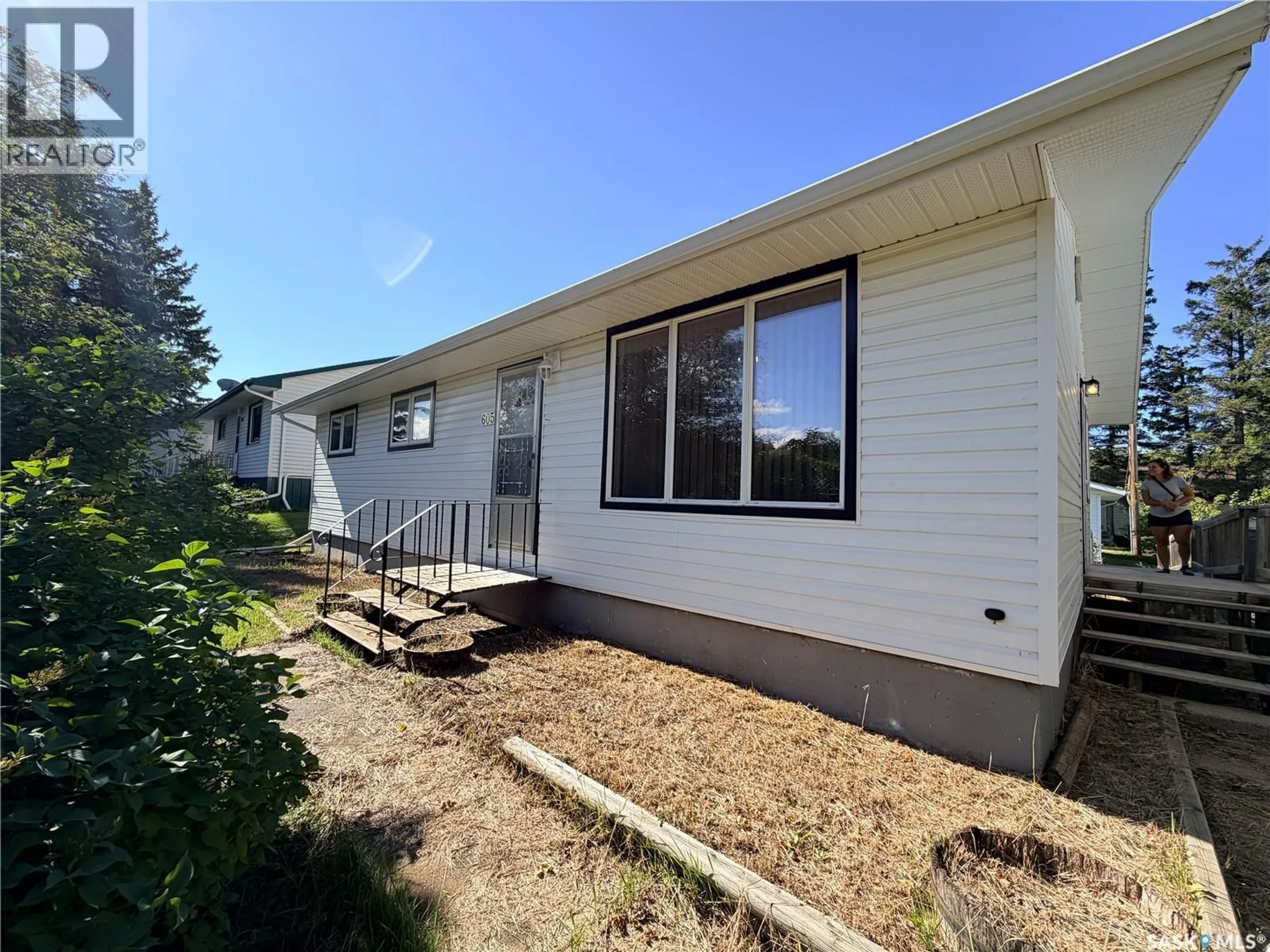 A pic from outside/outdoor area/front of a property/back of a property/a pic from drone, building for 605 HALL STREET, Kelvington Saskatchewan S0A1W0