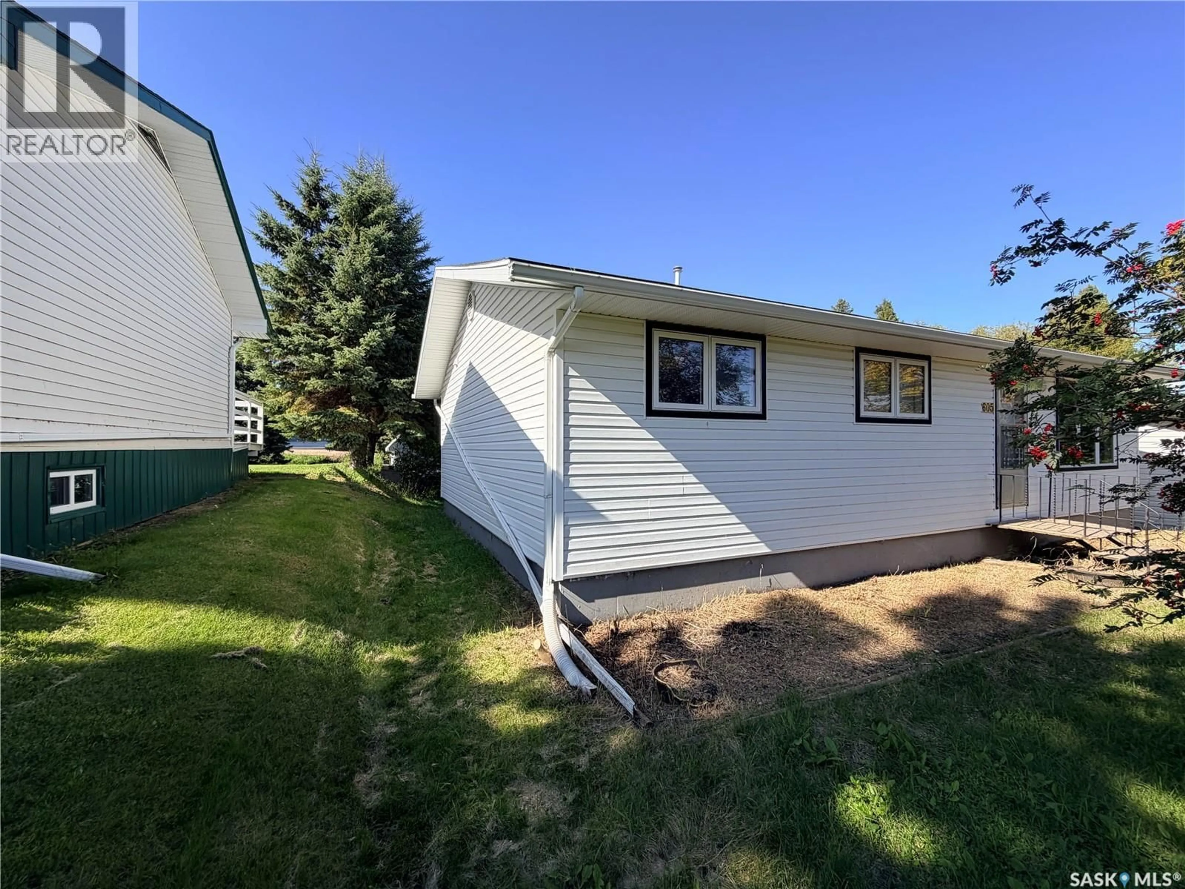 Home with vinyl exterior material, unknown for 605 HALL STREET, Kelvington Saskatchewan S0A1W0