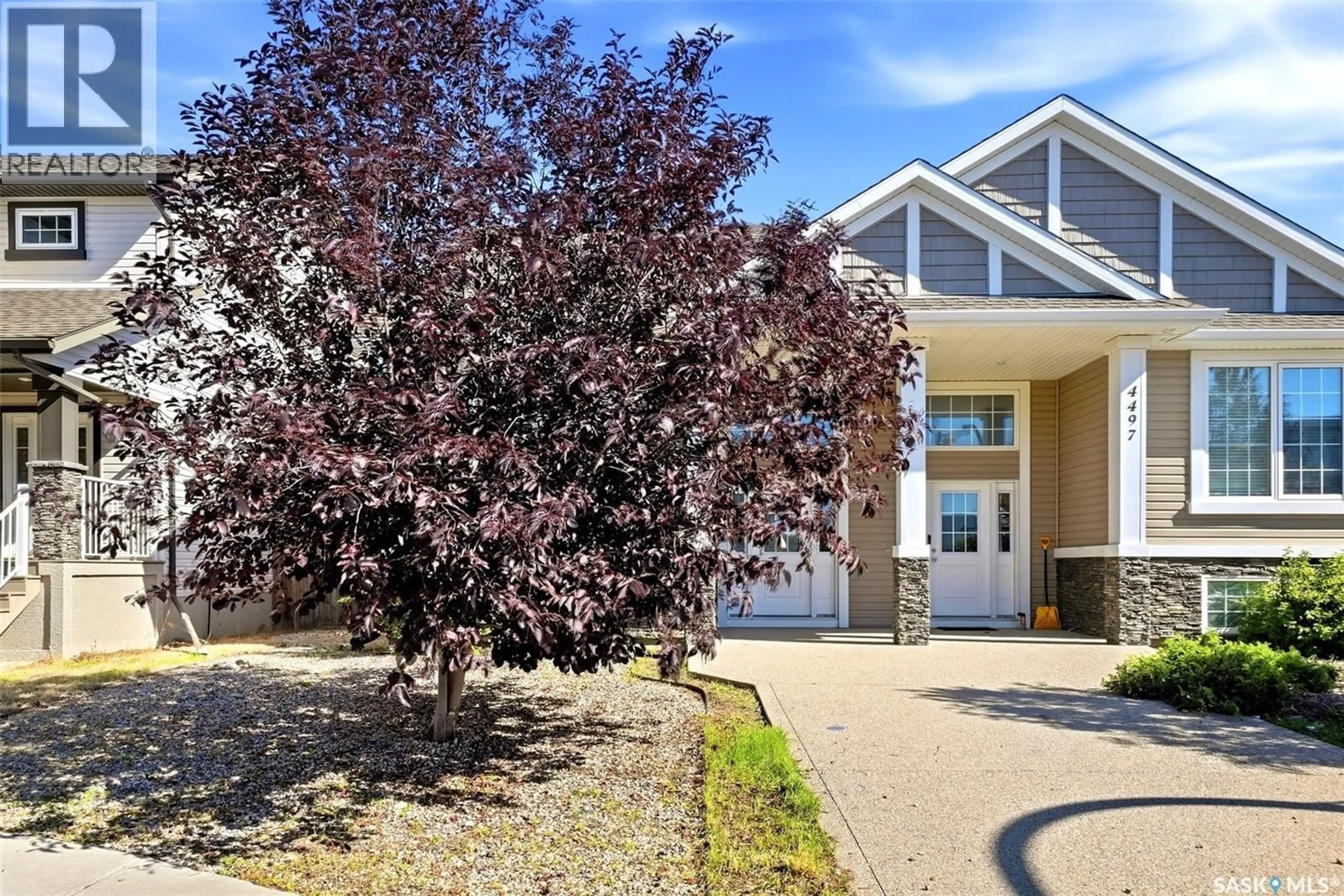 Home with vinyl exterior material, street for 4493 JAMES HILL ROAD, Regina Saskatchewan S4W0K5