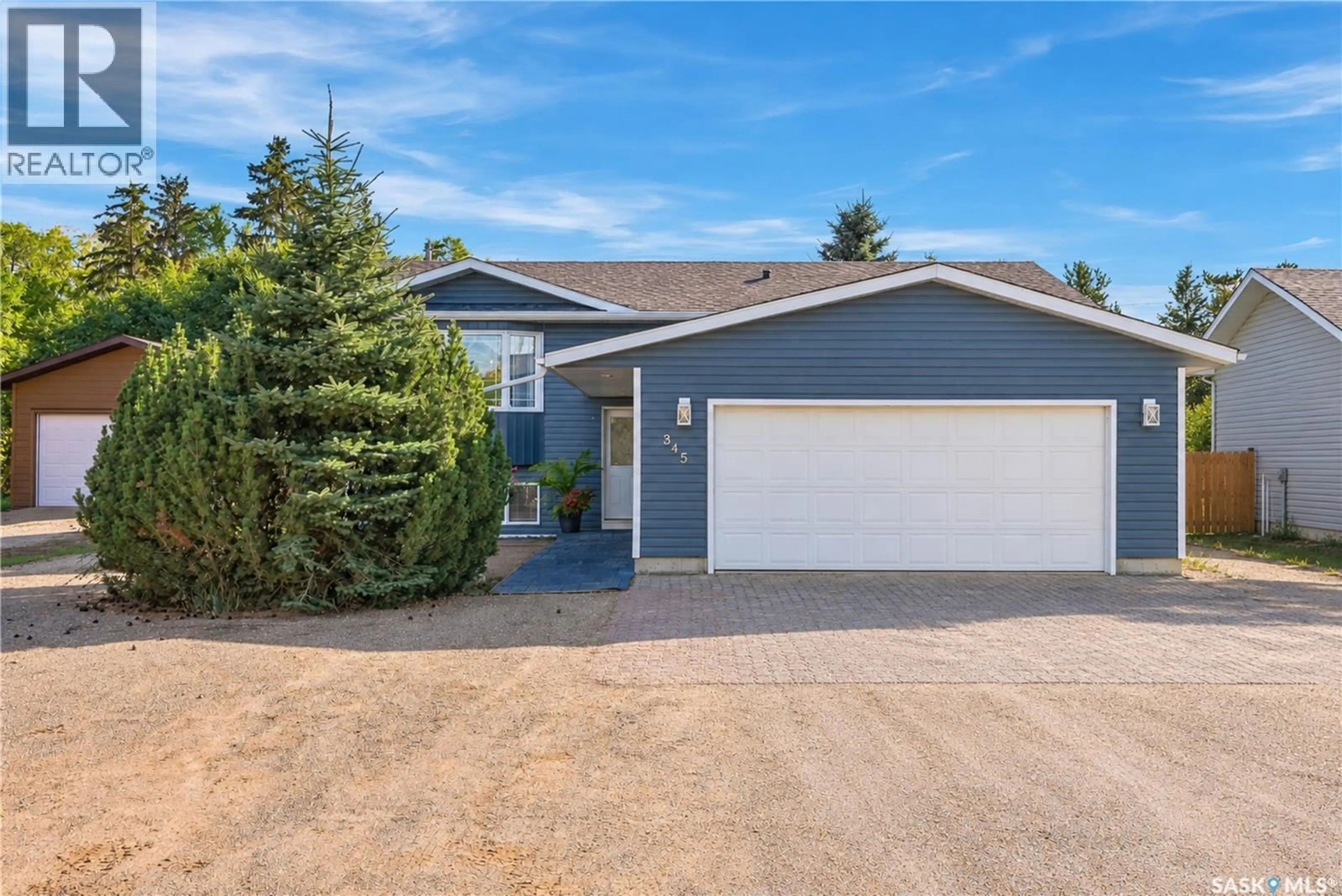 Home with vinyl exterior material, street for 345 CLARK AVENUE, Asquith Saskatchewan S0K0J0