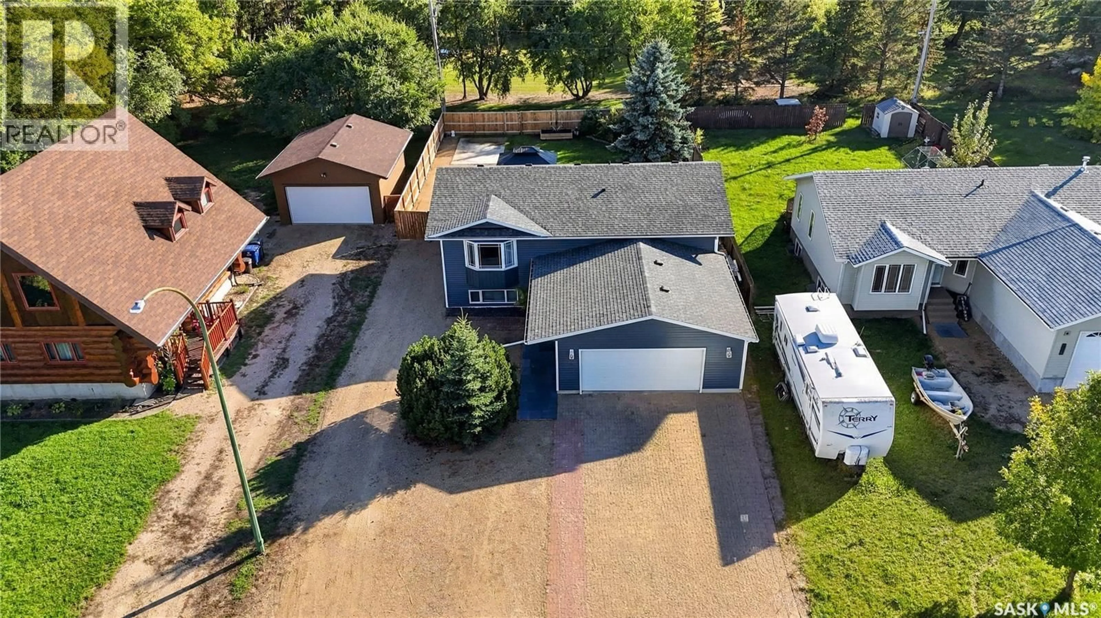 A pic from outside/outdoor area/front of a property/back of a property/a pic from drone, street for 345 CLARK AVENUE, Asquith Saskatchewan S0K0J0