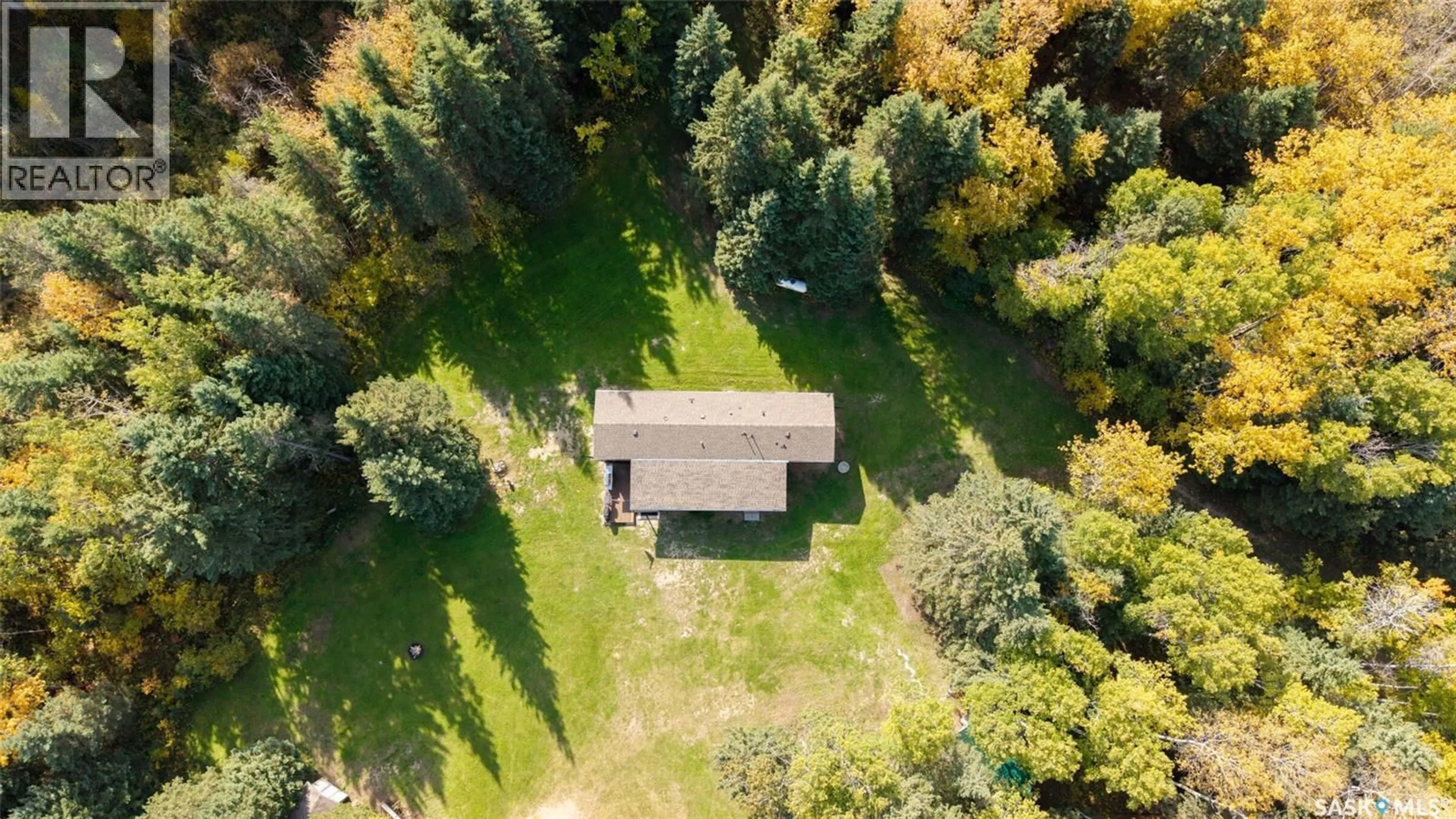 A pic from outside/outdoor area/front of a property/back of a property/a pic from drone, forest/trees view for 1 - 9 63 22W3, Lac des Îles Saskatchewan S0M1A0
