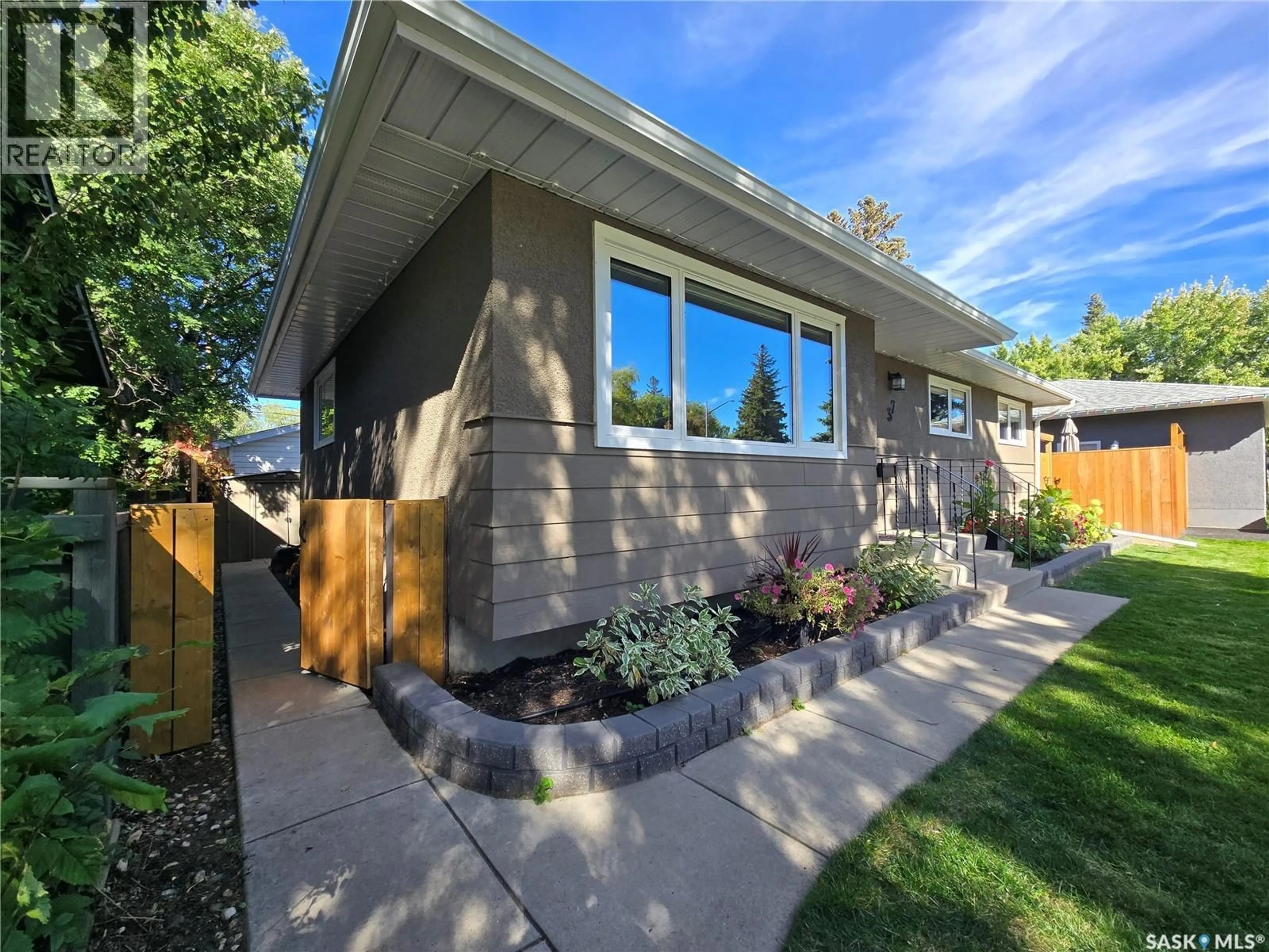 Home with vinyl exterior material, street for 37 DUNNING CRESCENT, Saskatoon Saskatchewan S7J2S6