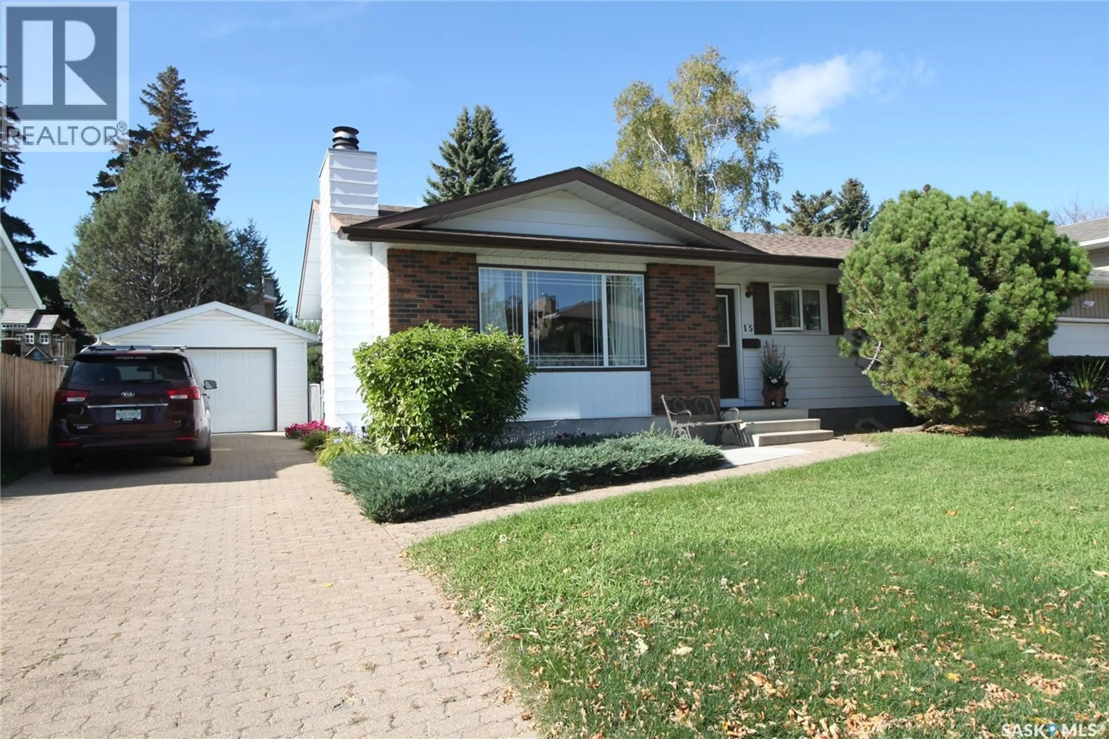 Home with vinyl exterior material, street for 15 SCHWAGER CRESCENT, Saskatoon Saskatchewan S7H5C1