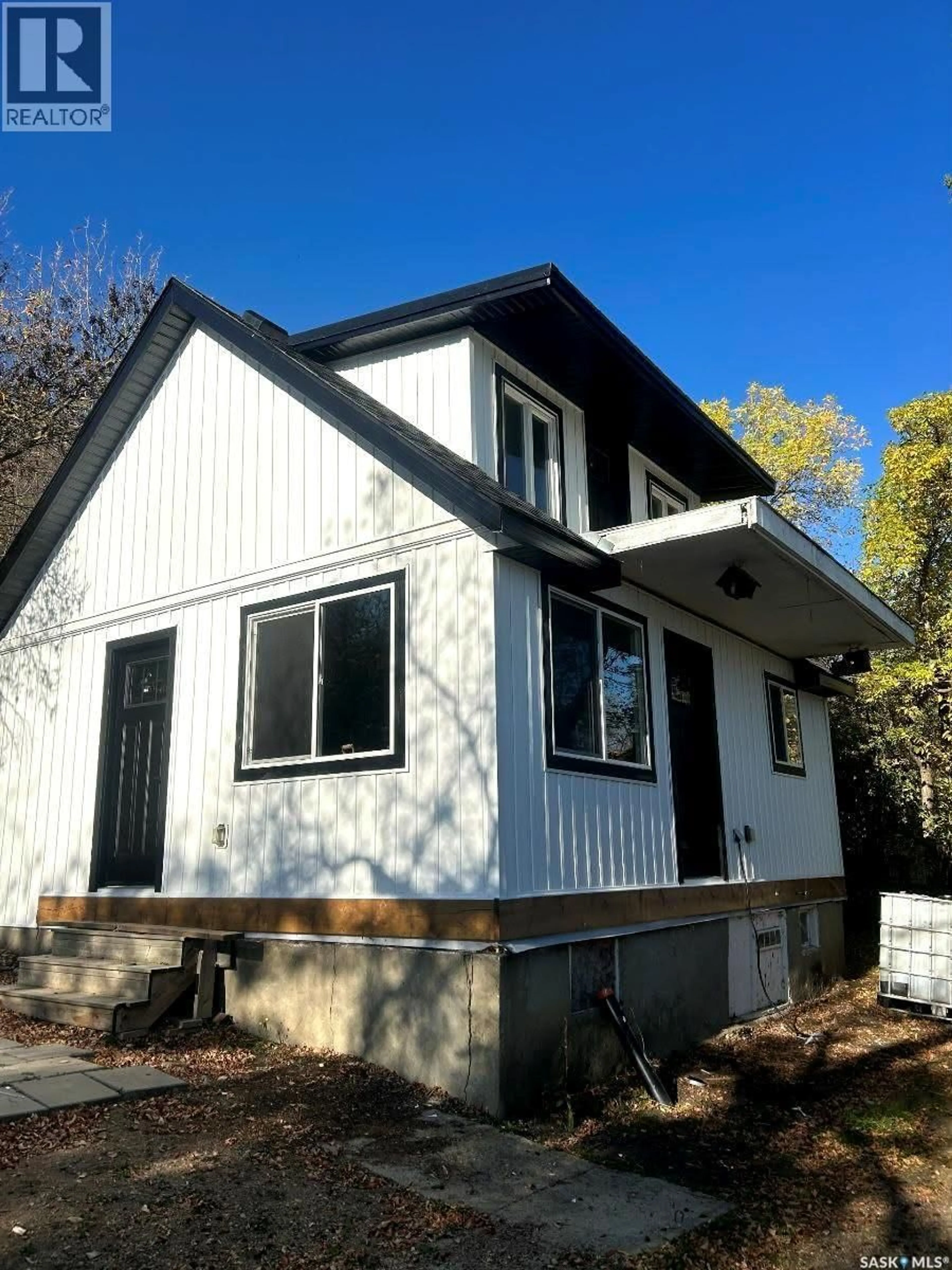Home with vinyl exterior material, street for 239 B-SAY-TAH ROAD, B-Say-Tah Saskatchewan S0G1S0