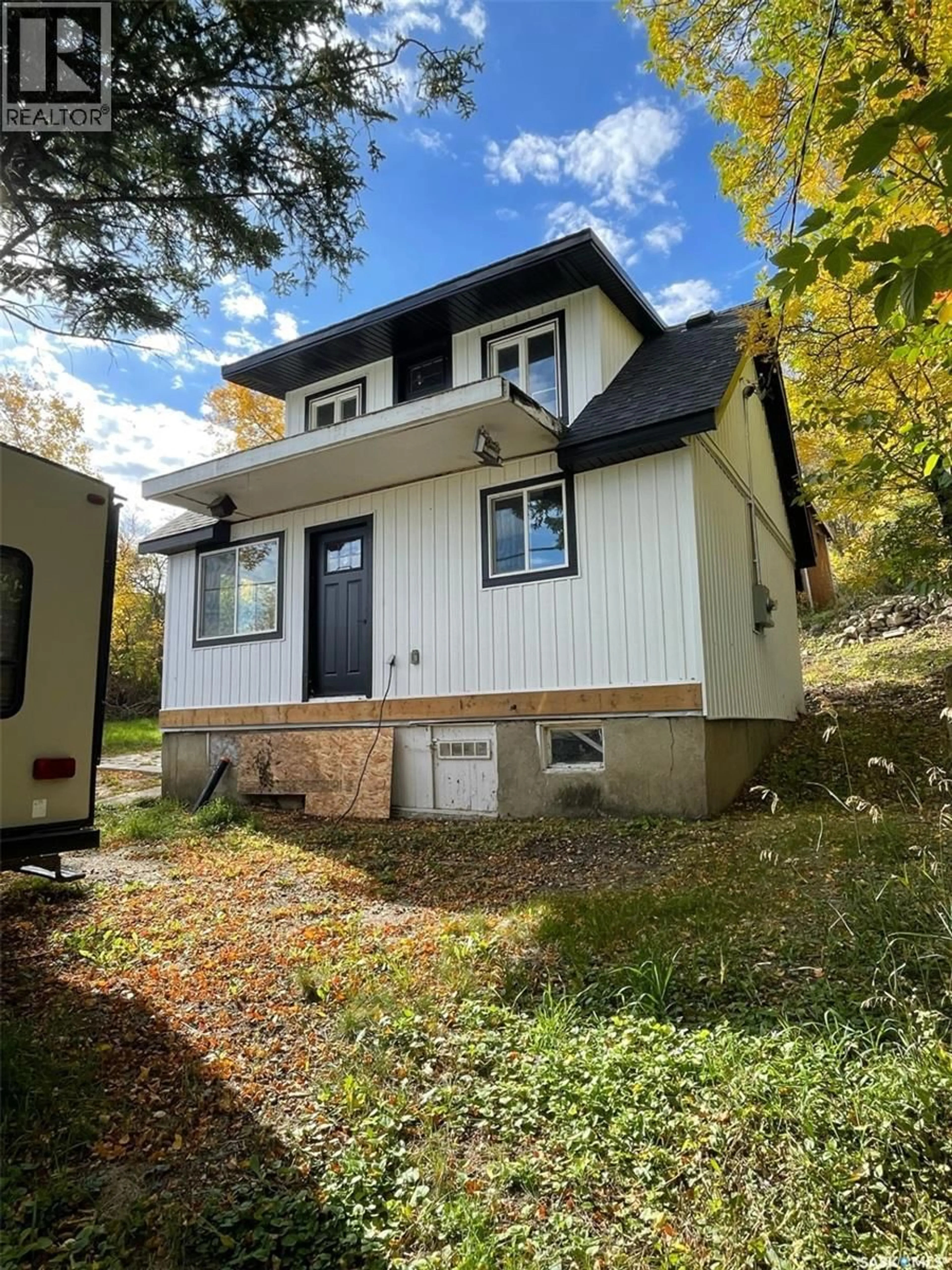Home with vinyl exterior material, street for 239 B-SAY-TAH ROAD, B-Say-Tah Saskatchewan S0G1S0