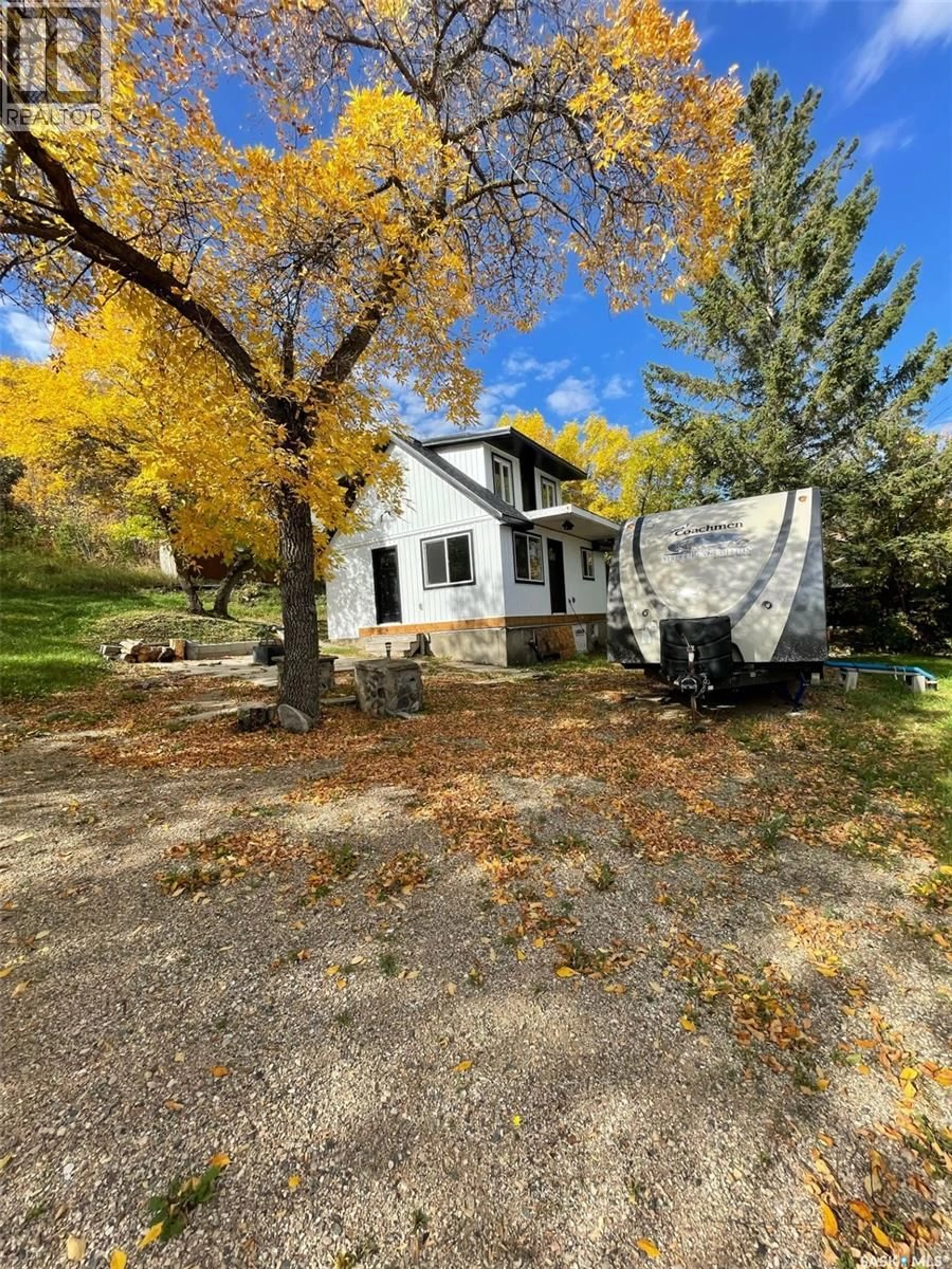 A pic from outside/outdoor area/front of a property/back of a property/a pic from drone, street for 239 B-SAY-TAH ROAD, B-Say-Tah Saskatchewan S0G1S0