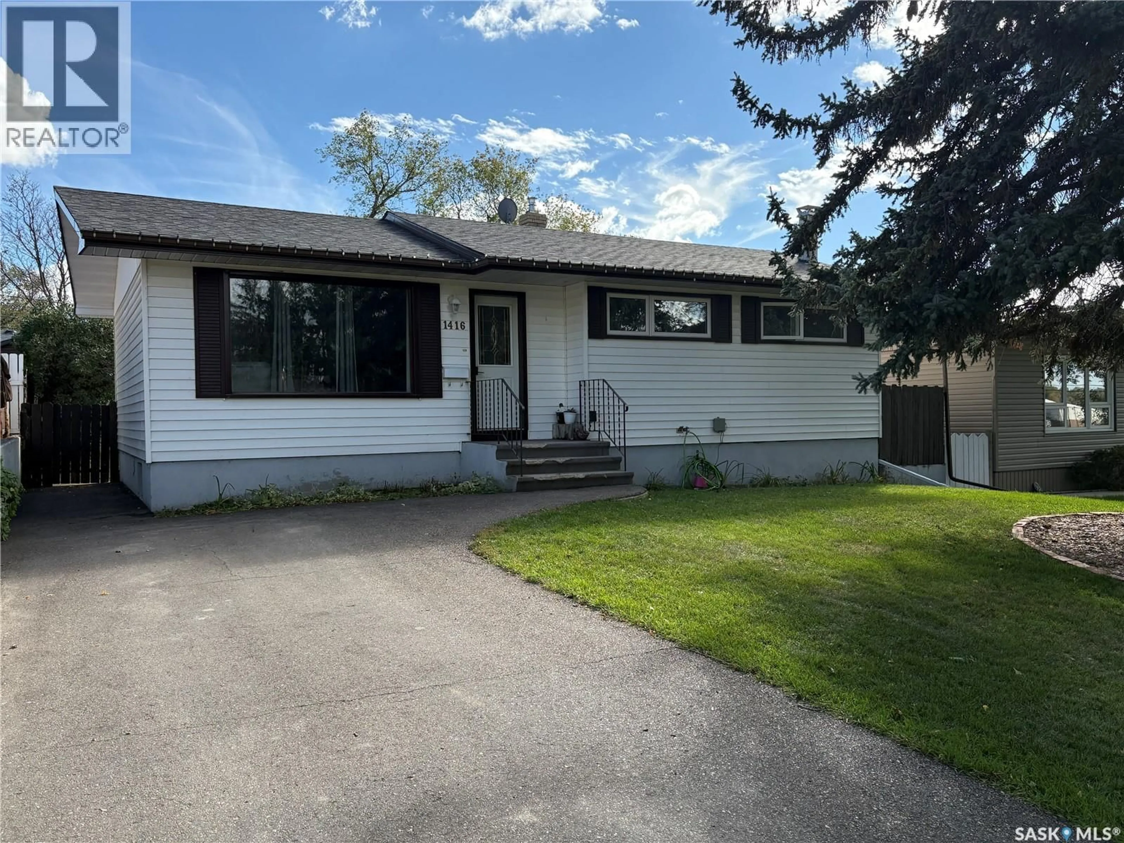 Home with vinyl exterior material, street for 1416 ASHLEY DRIVE, Swift Current Saskatchewan S9H1N5