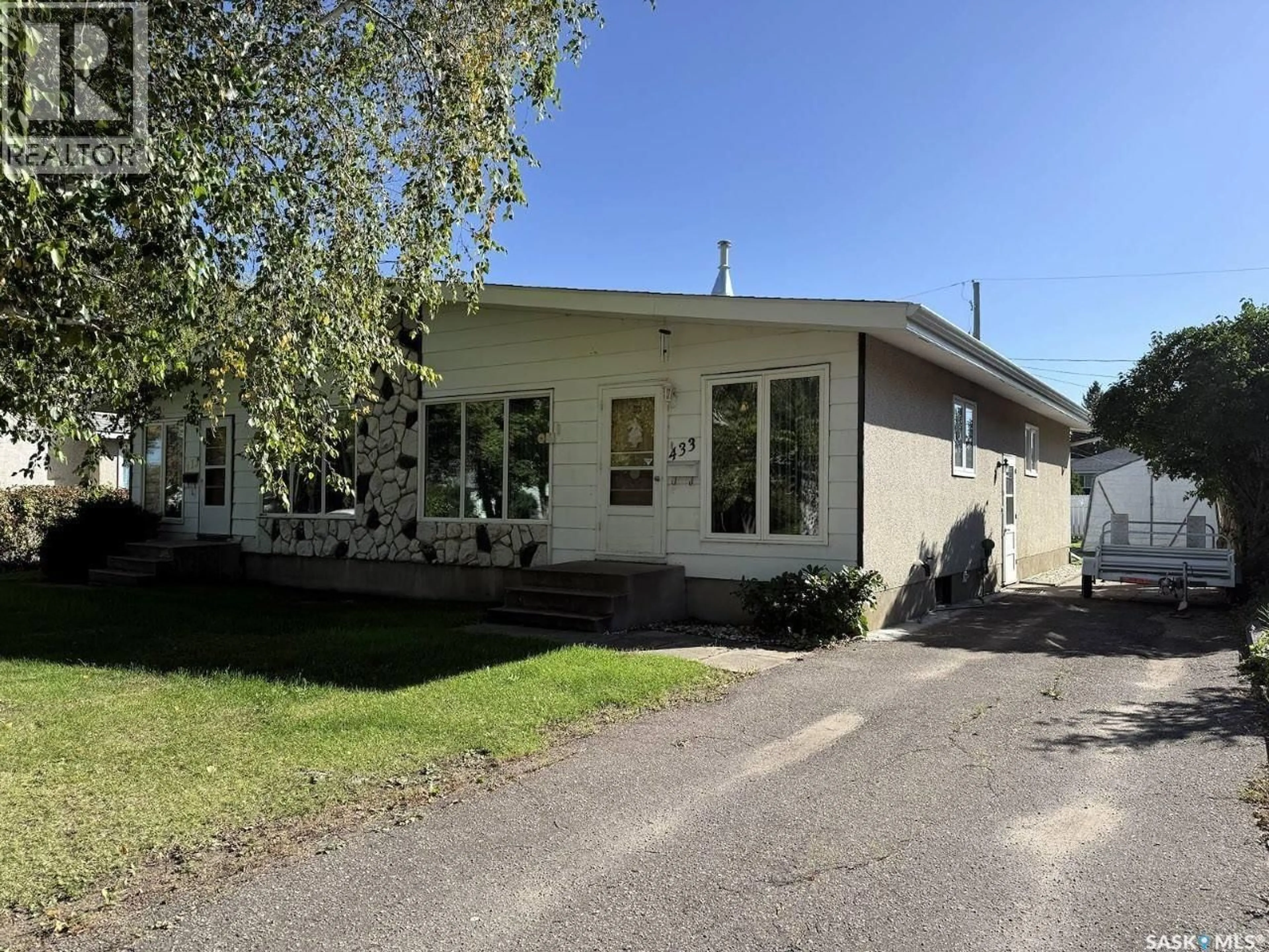 Home with vinyl exterior material, street for 433-435 25TH STREET, Prince Albert Saskatchewan S6V1T3