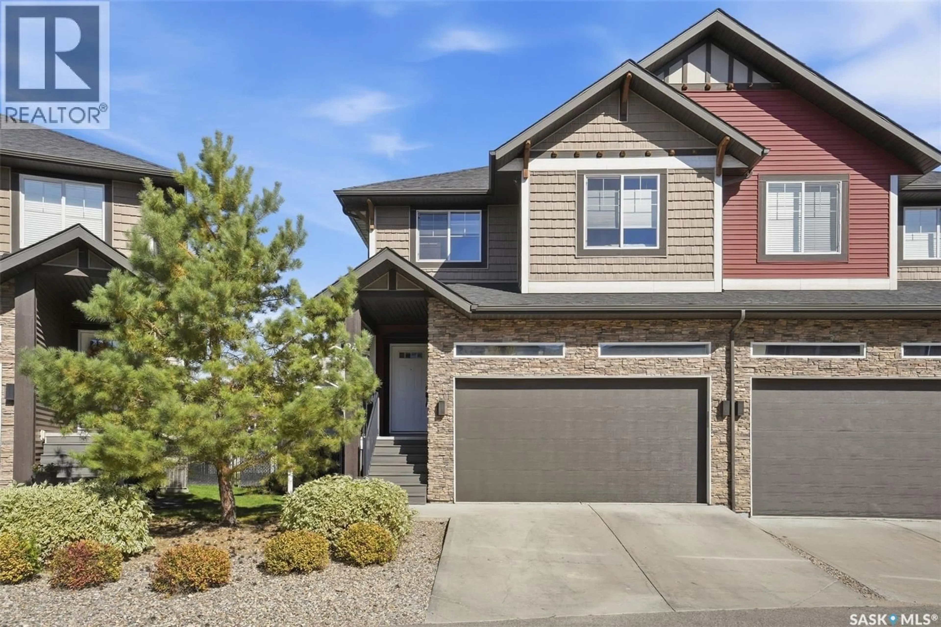Home with brick exterior material, street for 24 800 ST ANDREWS LANE, Warman Saskatchewan S0K4S4