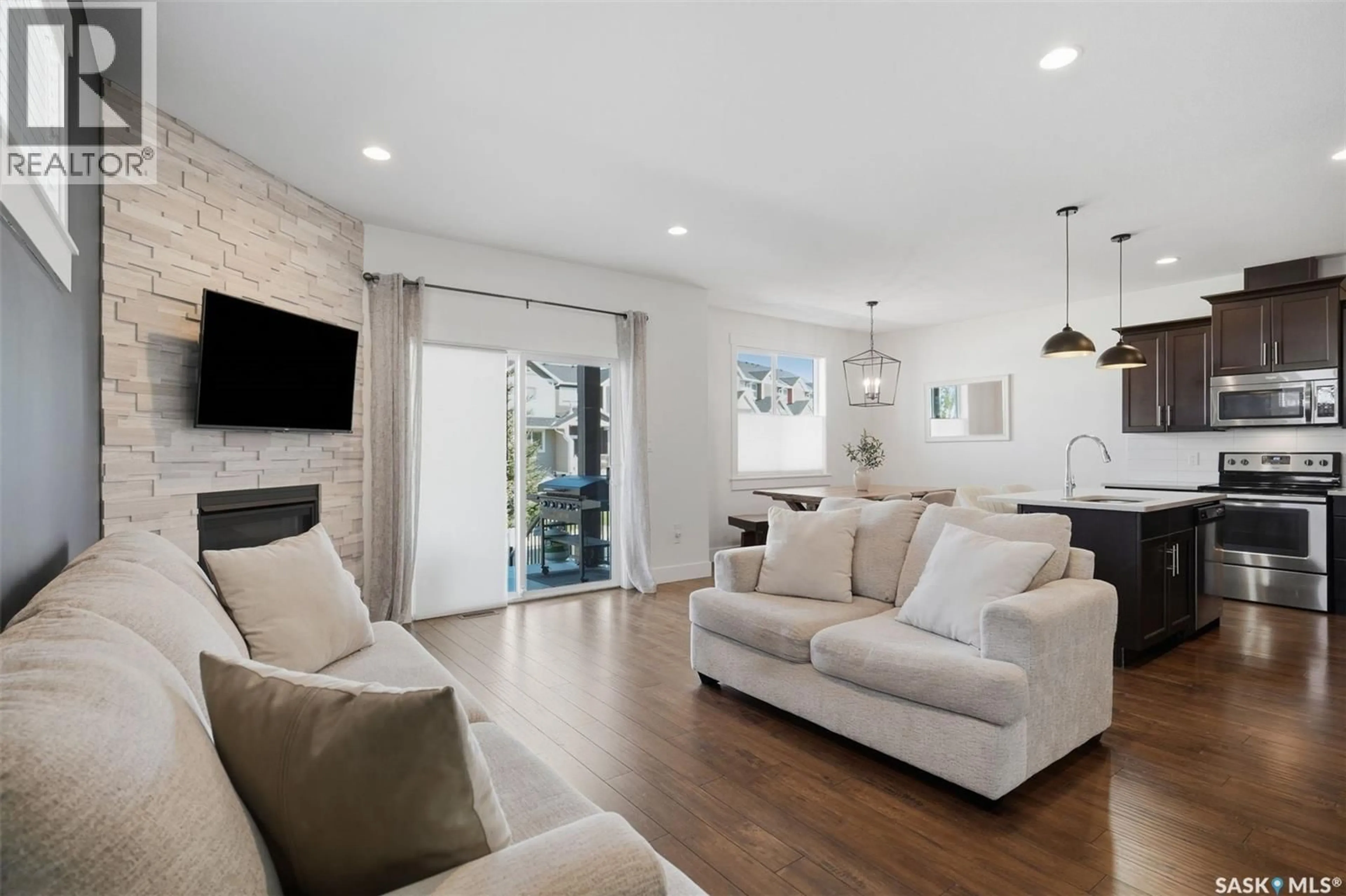 Living room with furniture, unknown for 24 800 ST ANDREWS LANE, Warman Saskatchewan S0K4S4