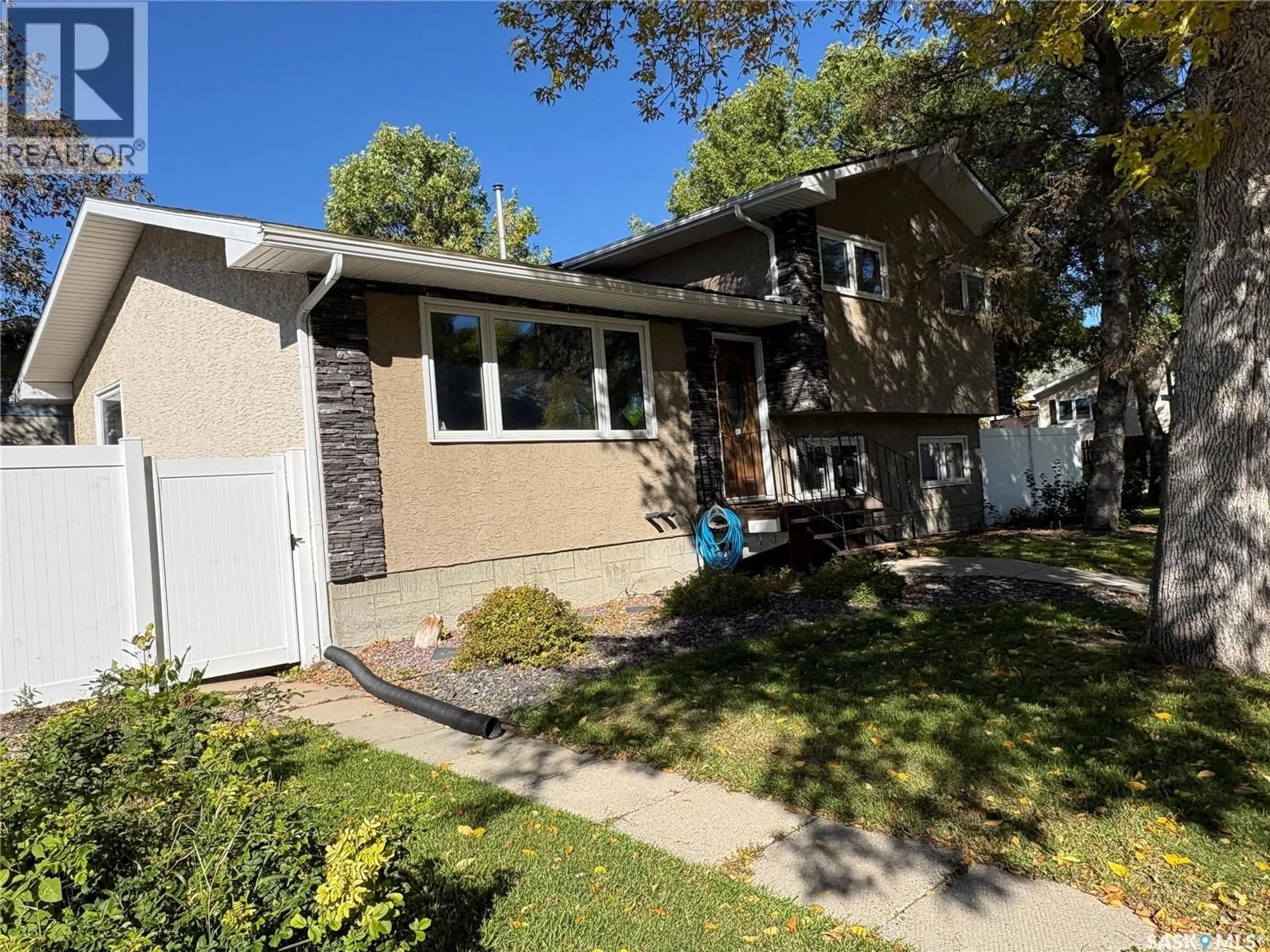 Home with vinyl exterior material, street for 147 FUHRMANN CRESCENT, Regina Saskatchewan S4R7W2