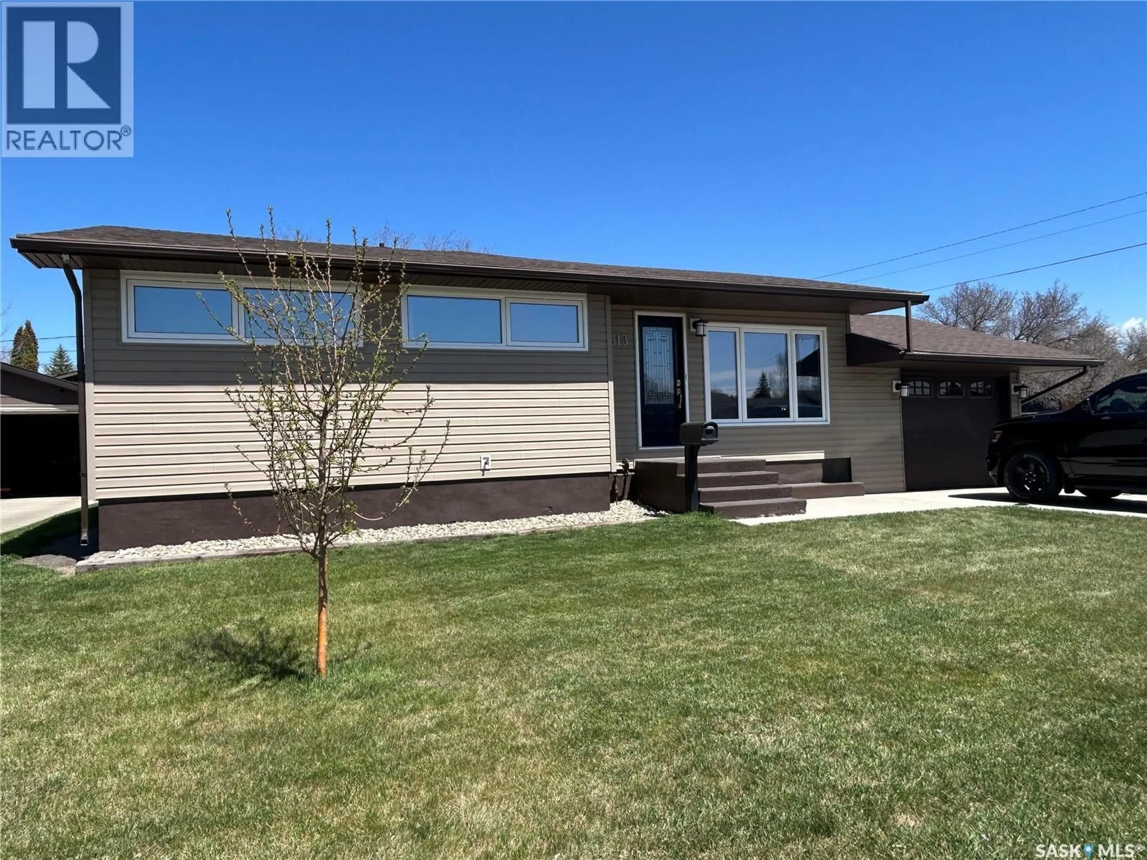 Home with vinyl exterior material, street for 1613 DIEPPE CRESCENT, Estevan Saskatchewan S4A1W8