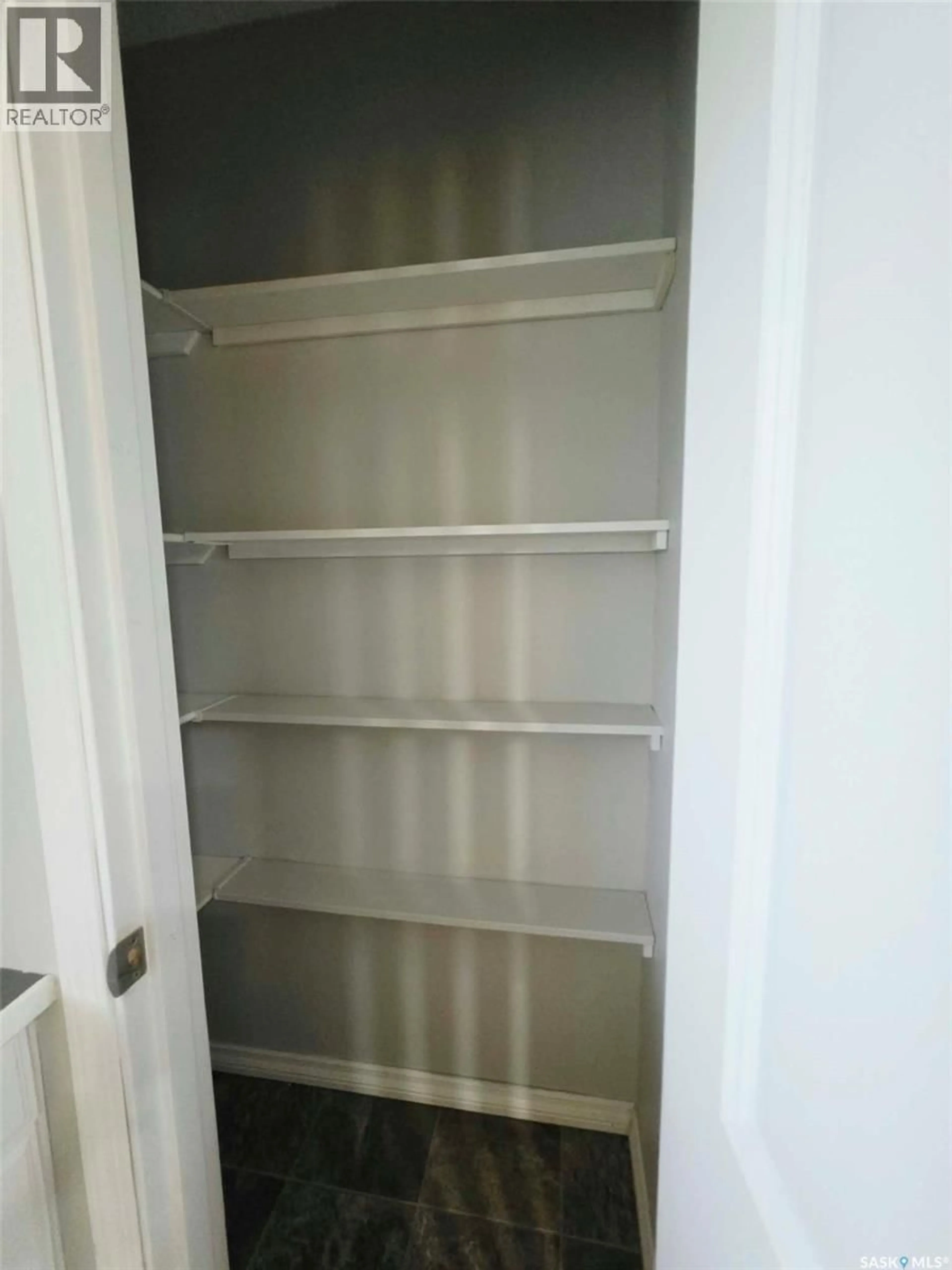 Storage room or clothes room or walk-in closet for 310 PARKS STREET, Whitewood Saskatchewan S0G5C0