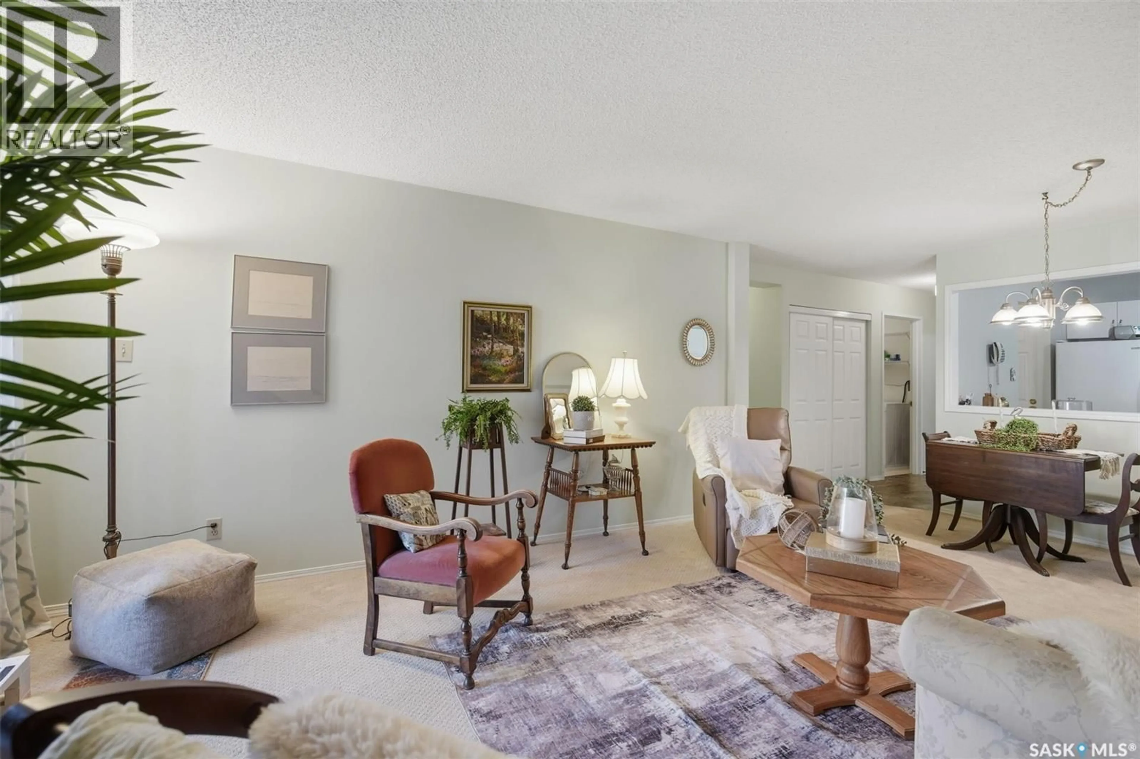 Living room with furniture, unknown for 201 - 104 CREE PLACE, Saskatoon Saskatchewan S7K7Z3