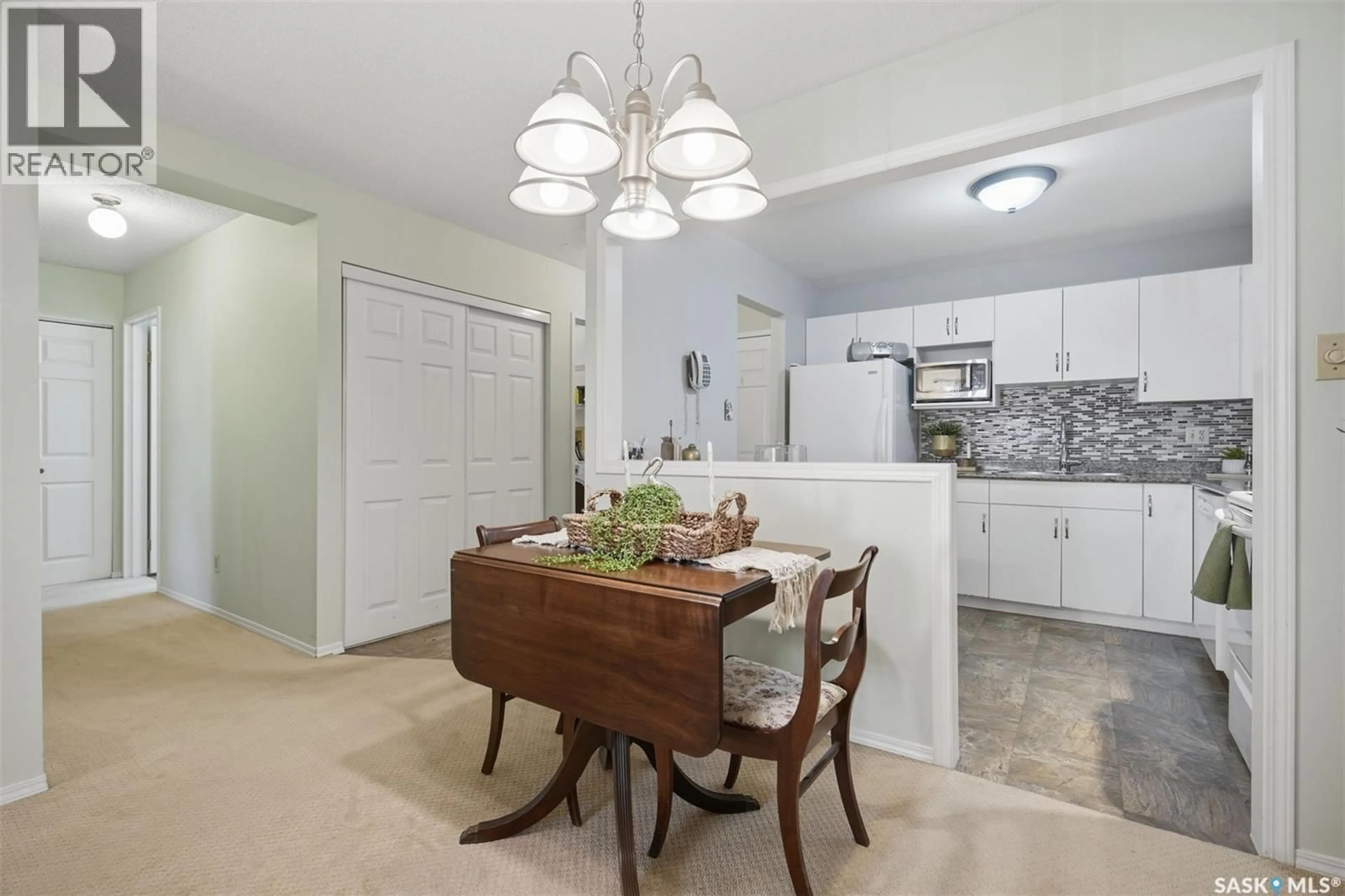 Open concept kitchen, unknown for 201 - 104 CREE PLACE, Saskatoon Saskatchewan S7K7Z3