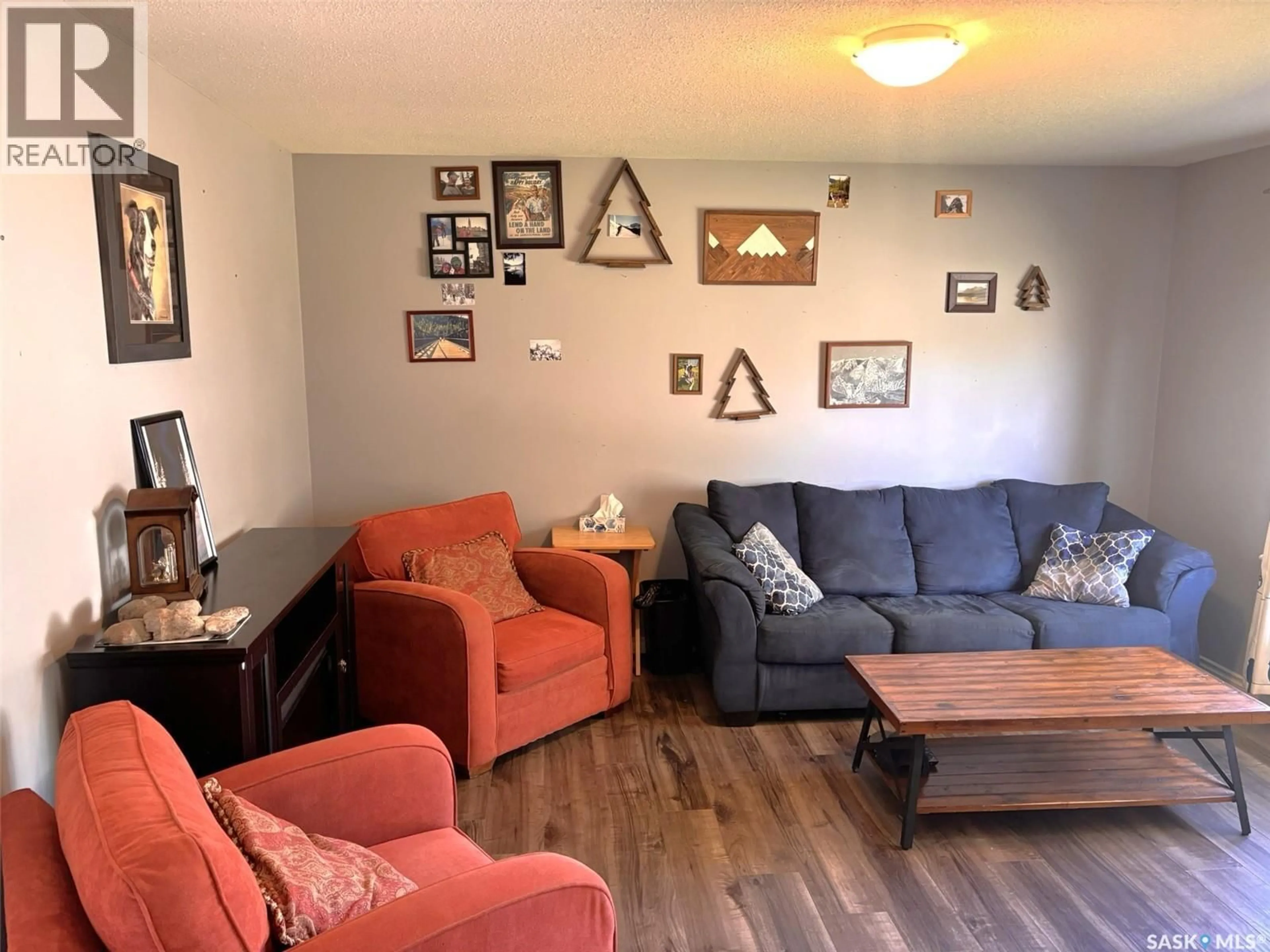 Living room with furniture, unknown for 702 2ND STREET, Hanley Saskatchewan S0G2E0