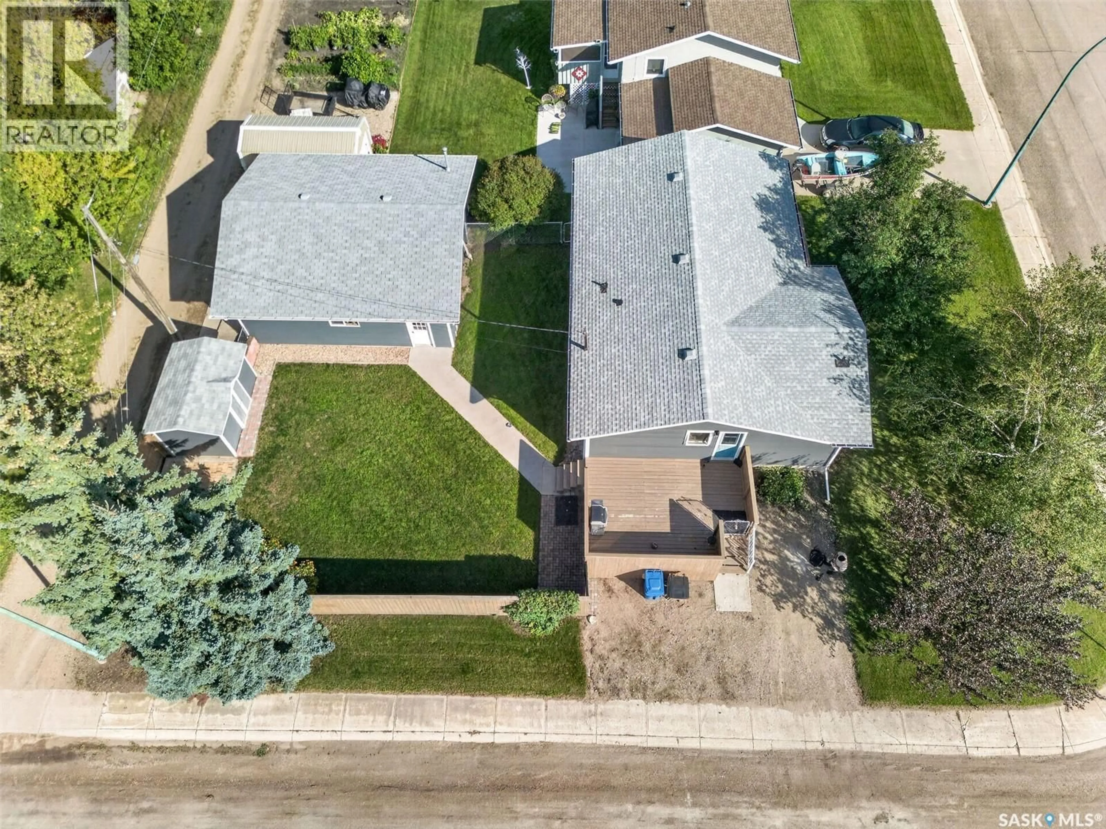 A pic from outside/outdoor area/front of a property/back of a property/a pic from drone, street for 220 MILLBURN STREET, Melfort Saskatchewan S0E1A0