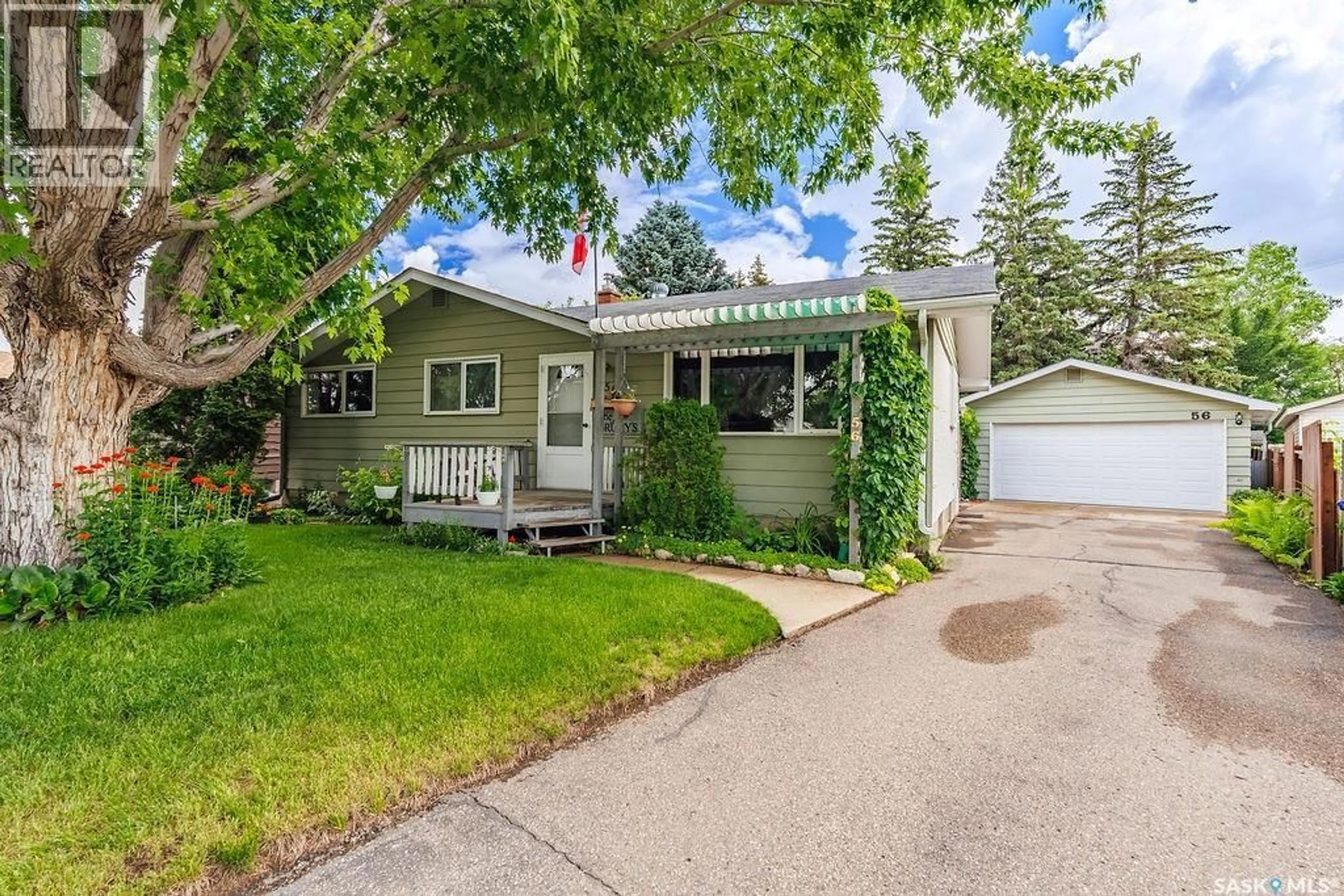 Home with vinyl exterior material, street for 56 MORRIS DRIVE, Saskatoon Saskatchewan S7L3V2