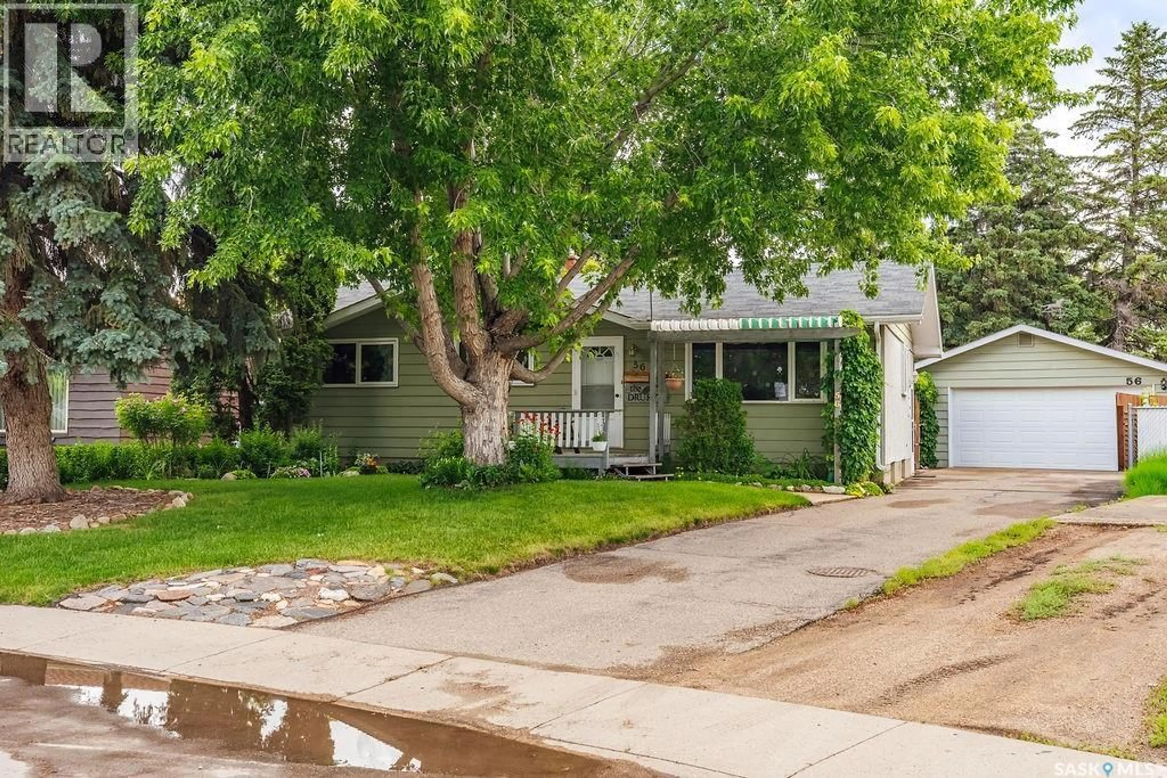 Home with vinyl exterior material, street for 56 MORRIS DRIVE, Saskatoon Saskatchewan S7L3V2