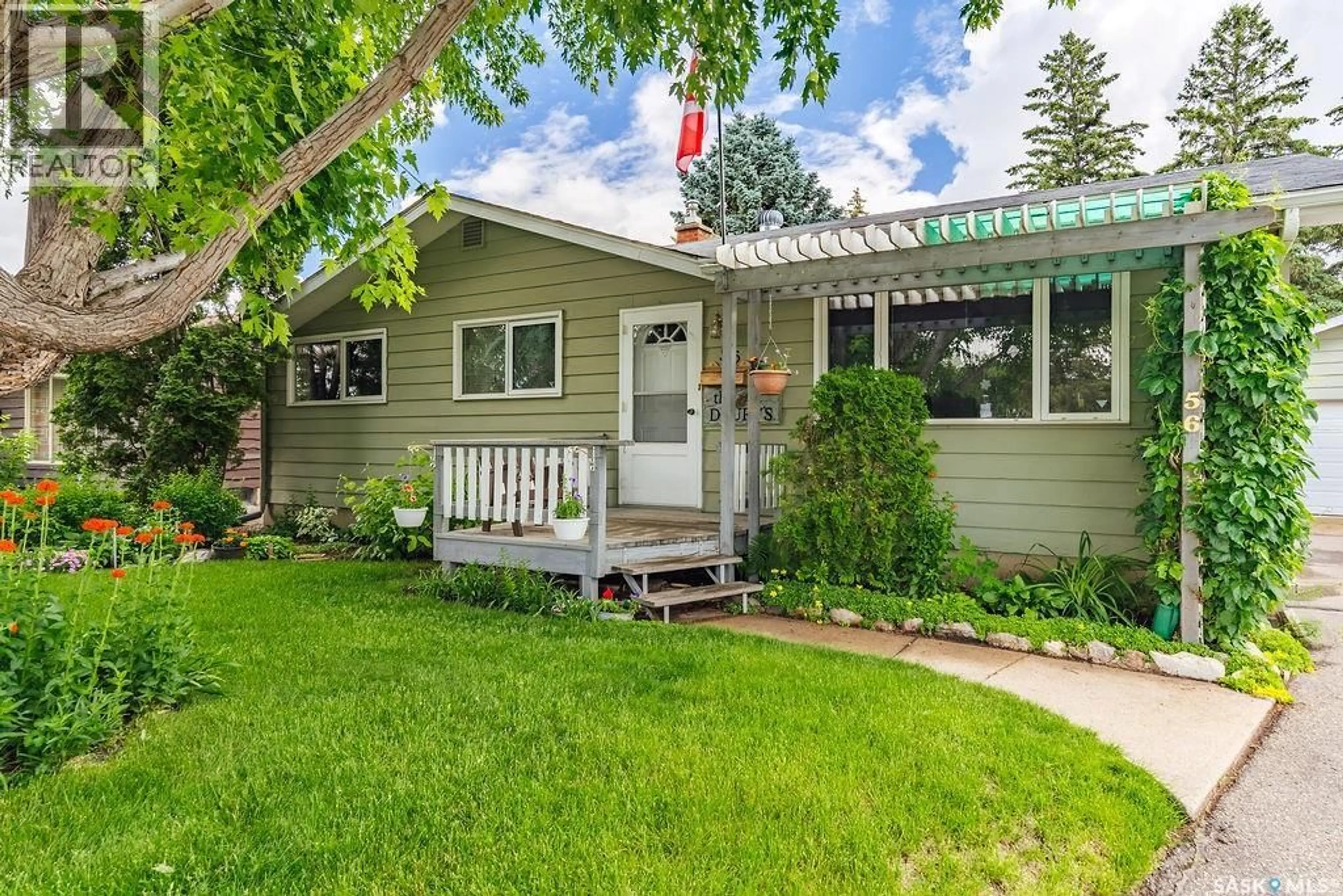 Home with vinyl exterior material, street for 56 MORRIS DRIVE, Saskatoon Saskatchewan S7L3V2