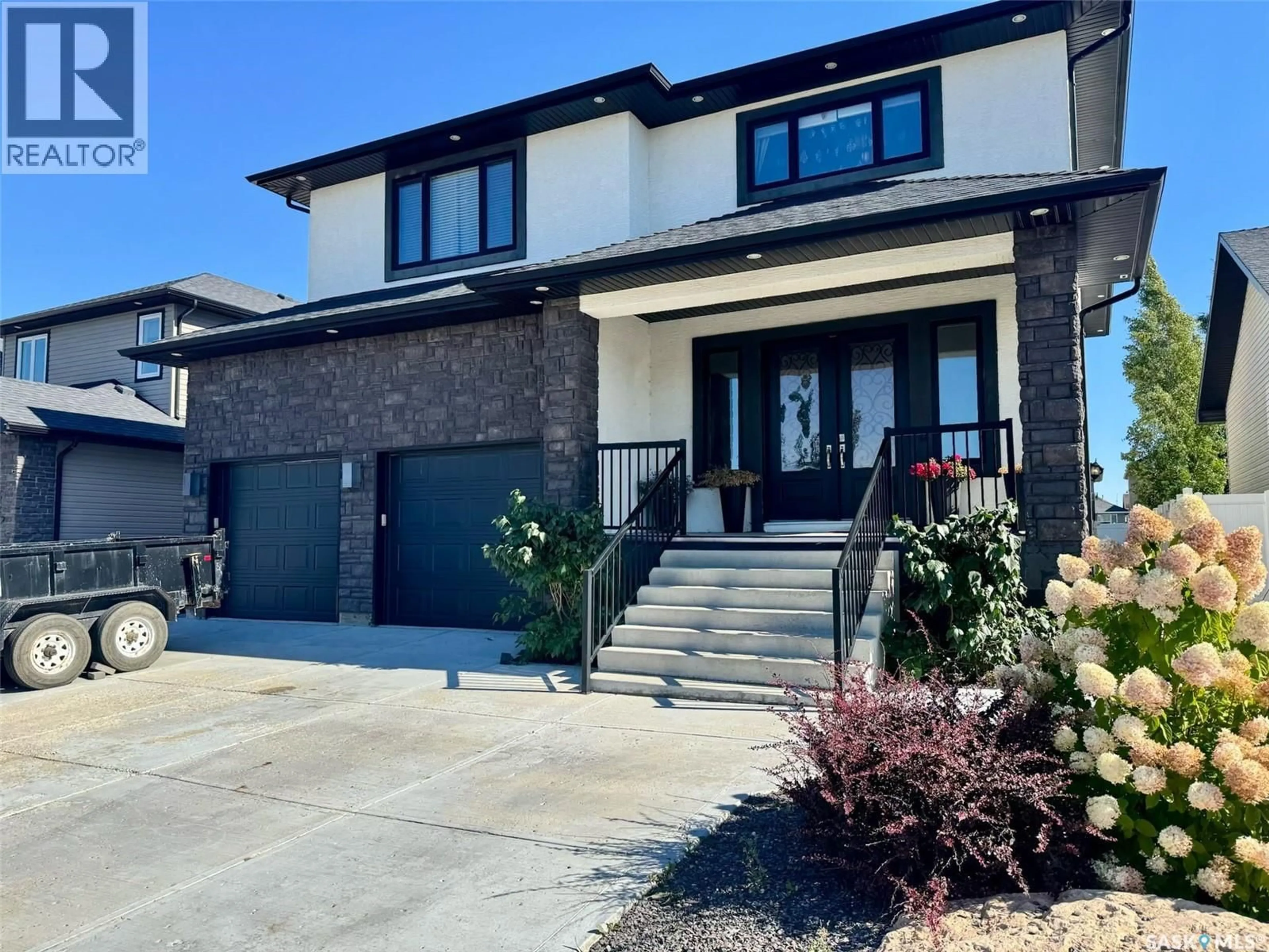 Home with brick exterior material, street for 319 ROY CRESCENT, Saskatoon Saskatchewan S7W0L1