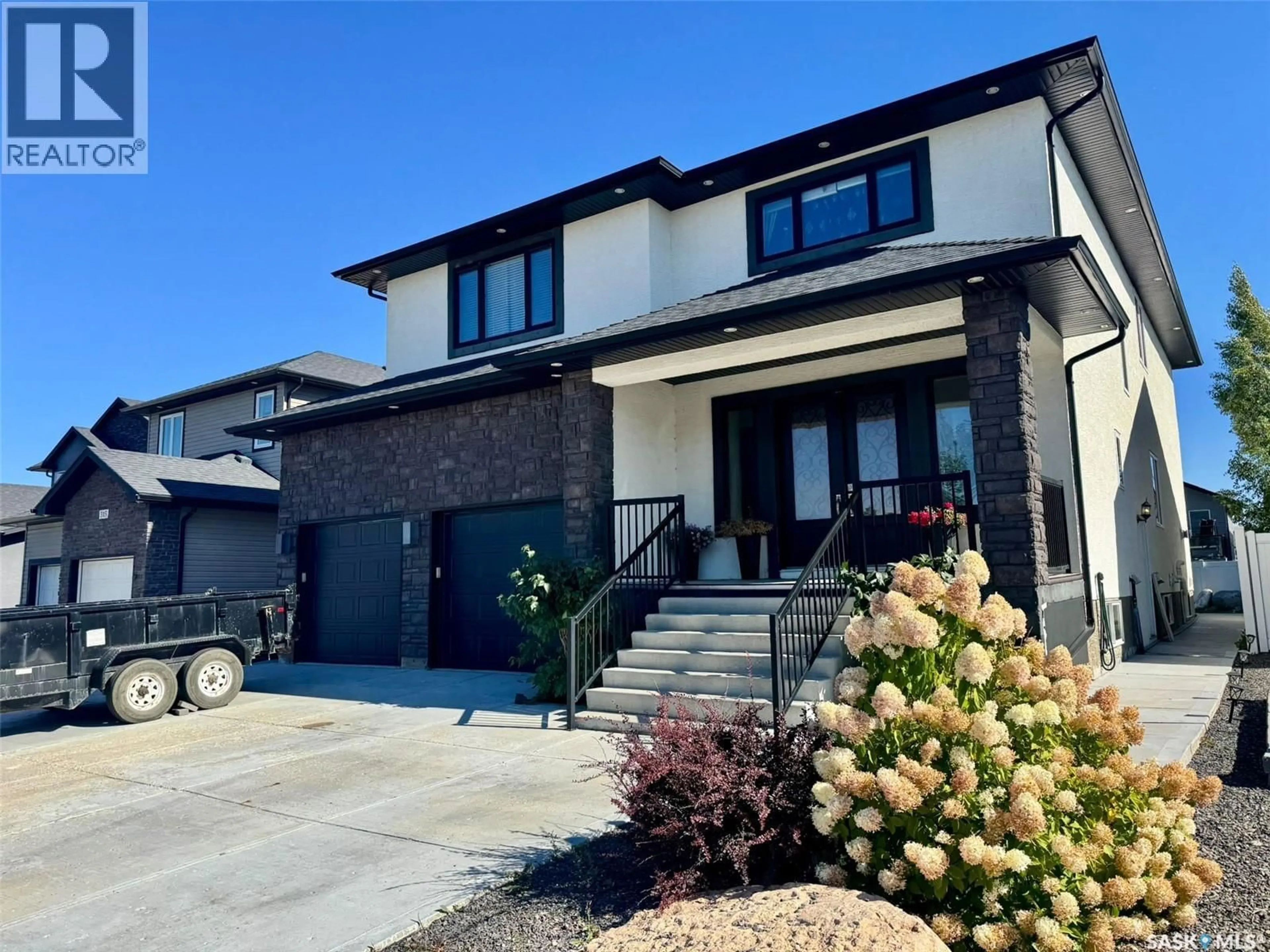 Home with brick exterior material, street for 319 ROY CRESCENT, Saskatoon Saskatchewan S7W0L1