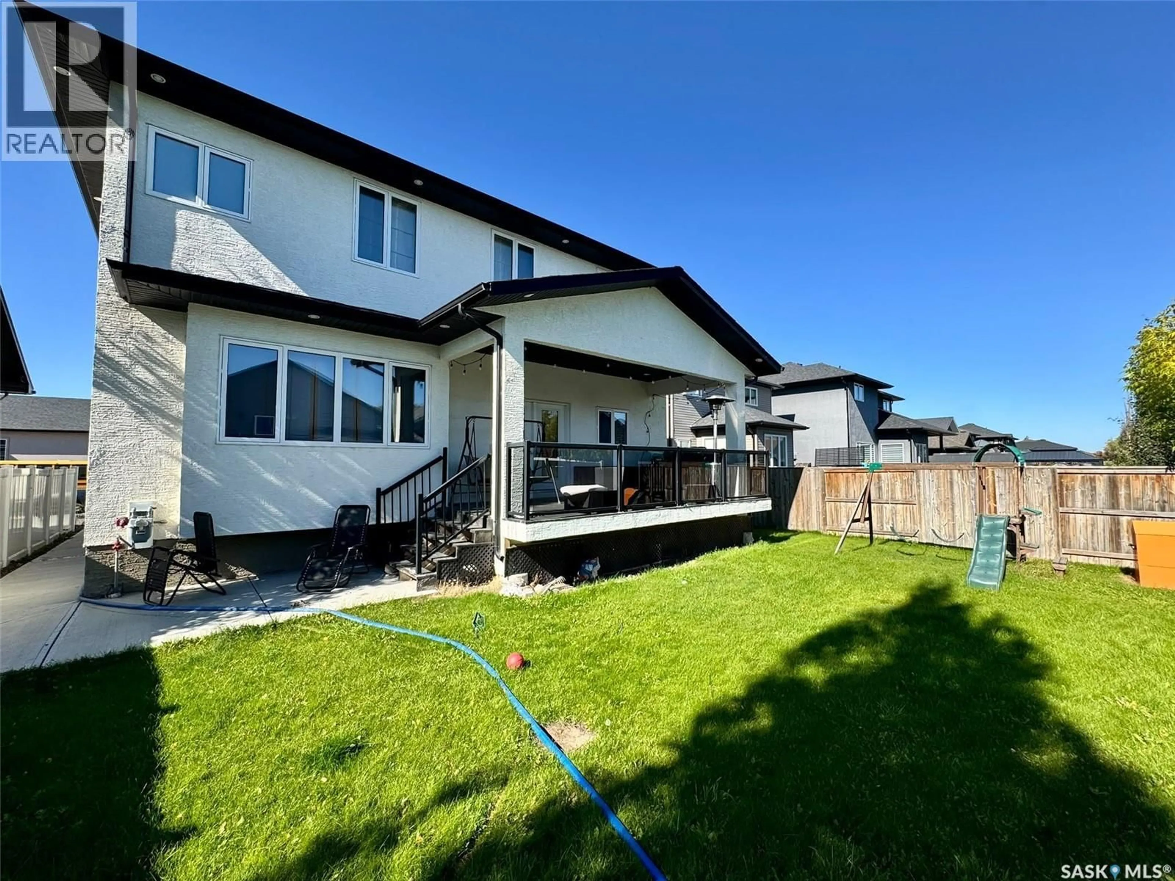 A pic from outside/outdoor area/front of a property/back of a property/a pic from drone, unknown for 319 ROY CRESCENT, Saskatoon Saskatchewan S7W0L1