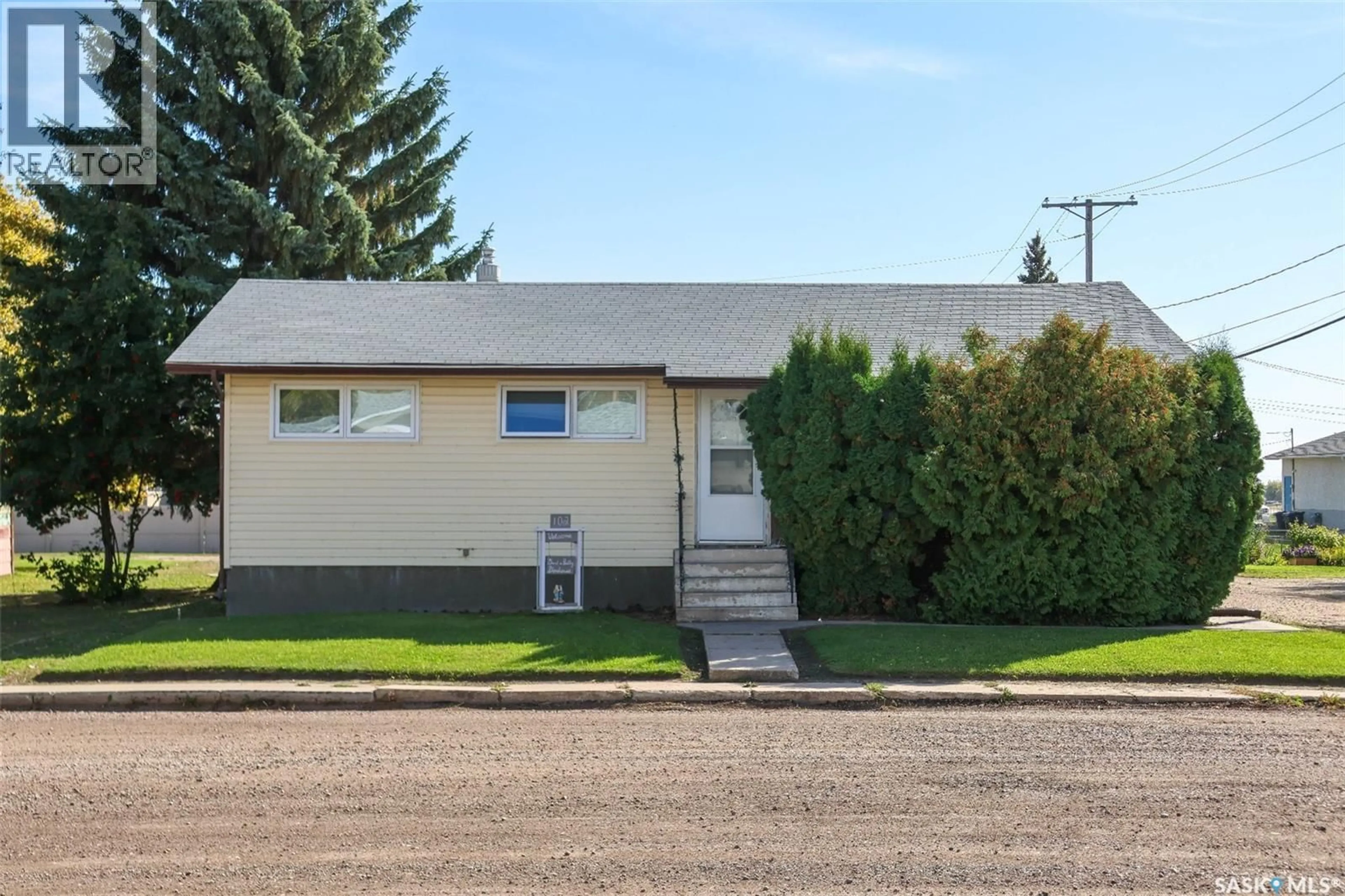 Home with vinyl exterior material, street for 102 4TH AVENUE, Blaine Lake Saskatchewan S0J0J0