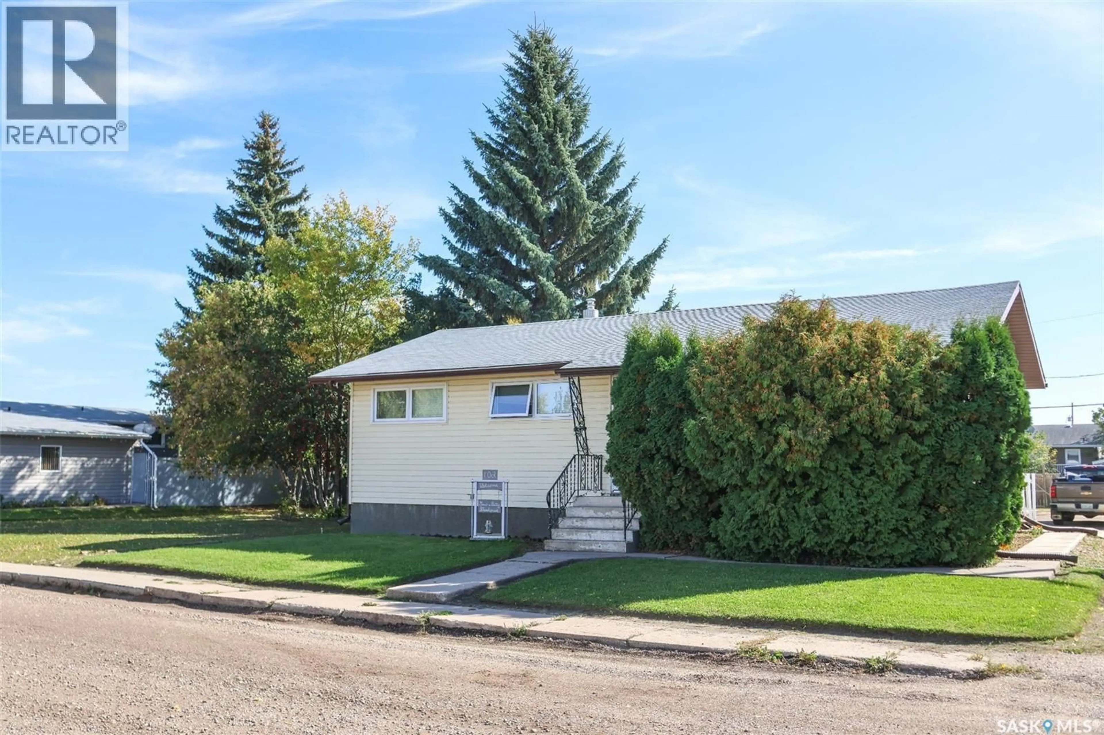 Home with vinyl exterior material, street for 102 4TH AVENUE, Blaine Lake Saskatchewan S0J0J0