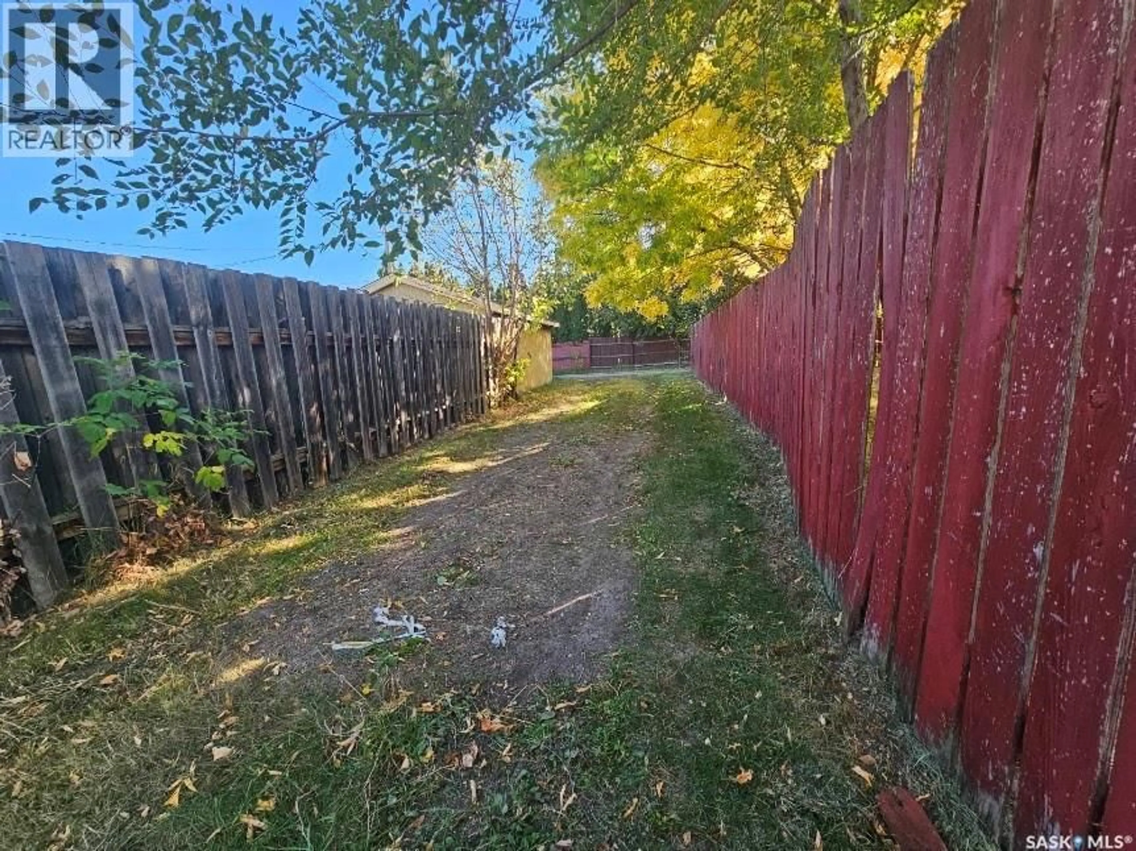 A pic from outside/outdoor area/front of a property/back of a property/a pic from drone, forest/trees view for 572 103RD STREET, North Battleford Saskatchewan S9A1J7