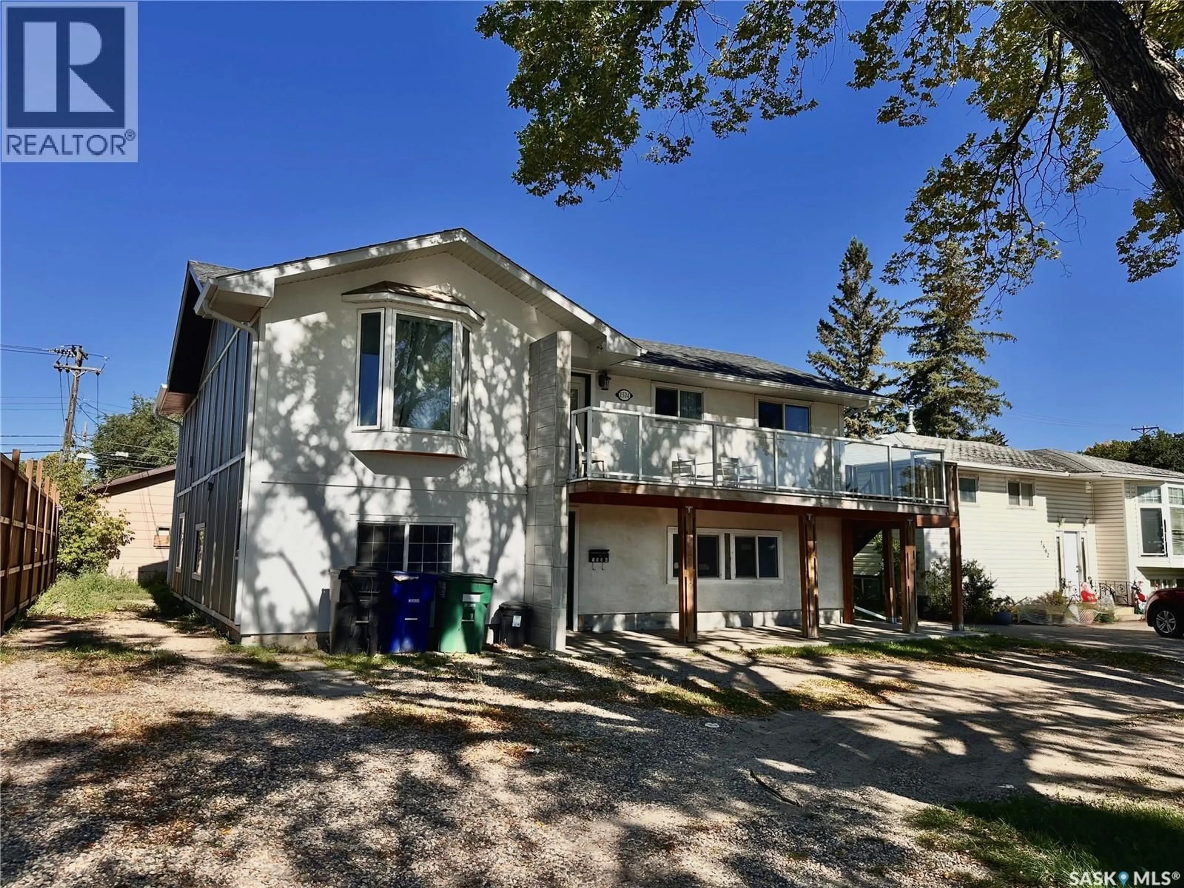 A pic from outside/outdoor area/front of a property/back of a property/a pic from drone, street for 1504 33RD STREET, Saskatoon Saskatchewan S7L0X2
