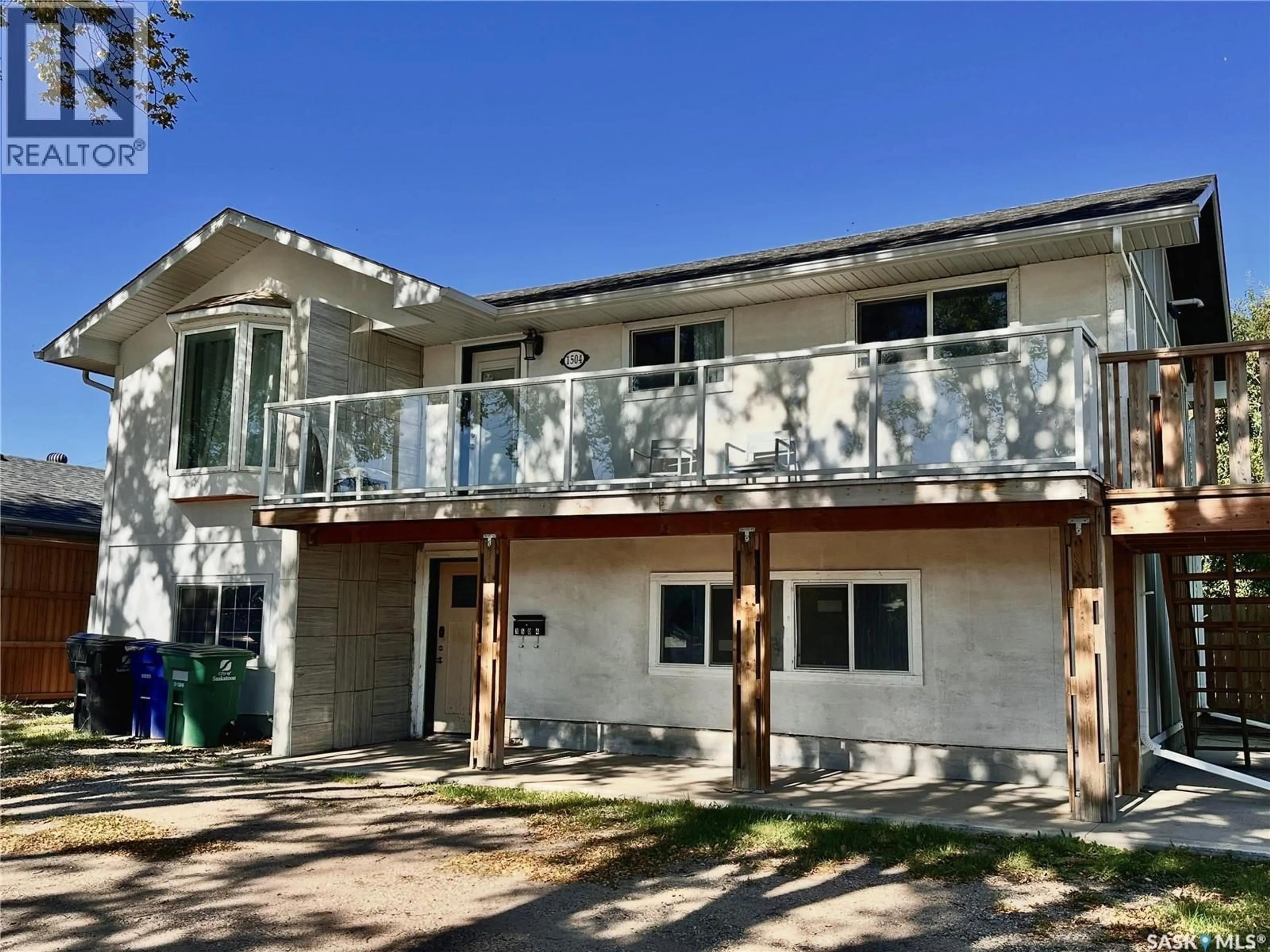 Home with vinyl exterior material, street for 1504 33RD STREET, Saskatoon Saskatchewan S7L0X2