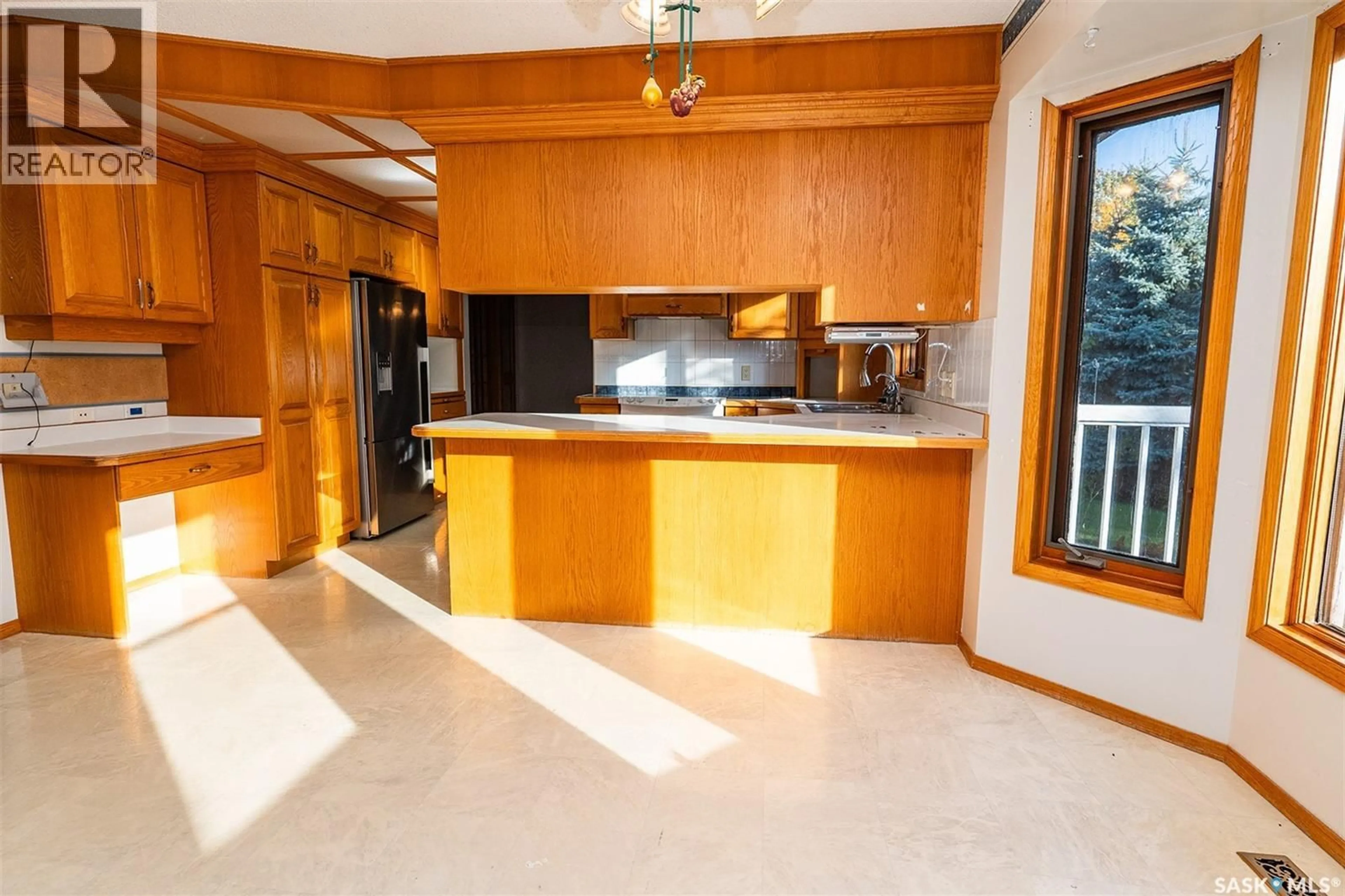 Open concept kitchen, ceramic/tile floor for 408A MILLER CRESCENT, Wynyard Saskatchewan S0A4T0