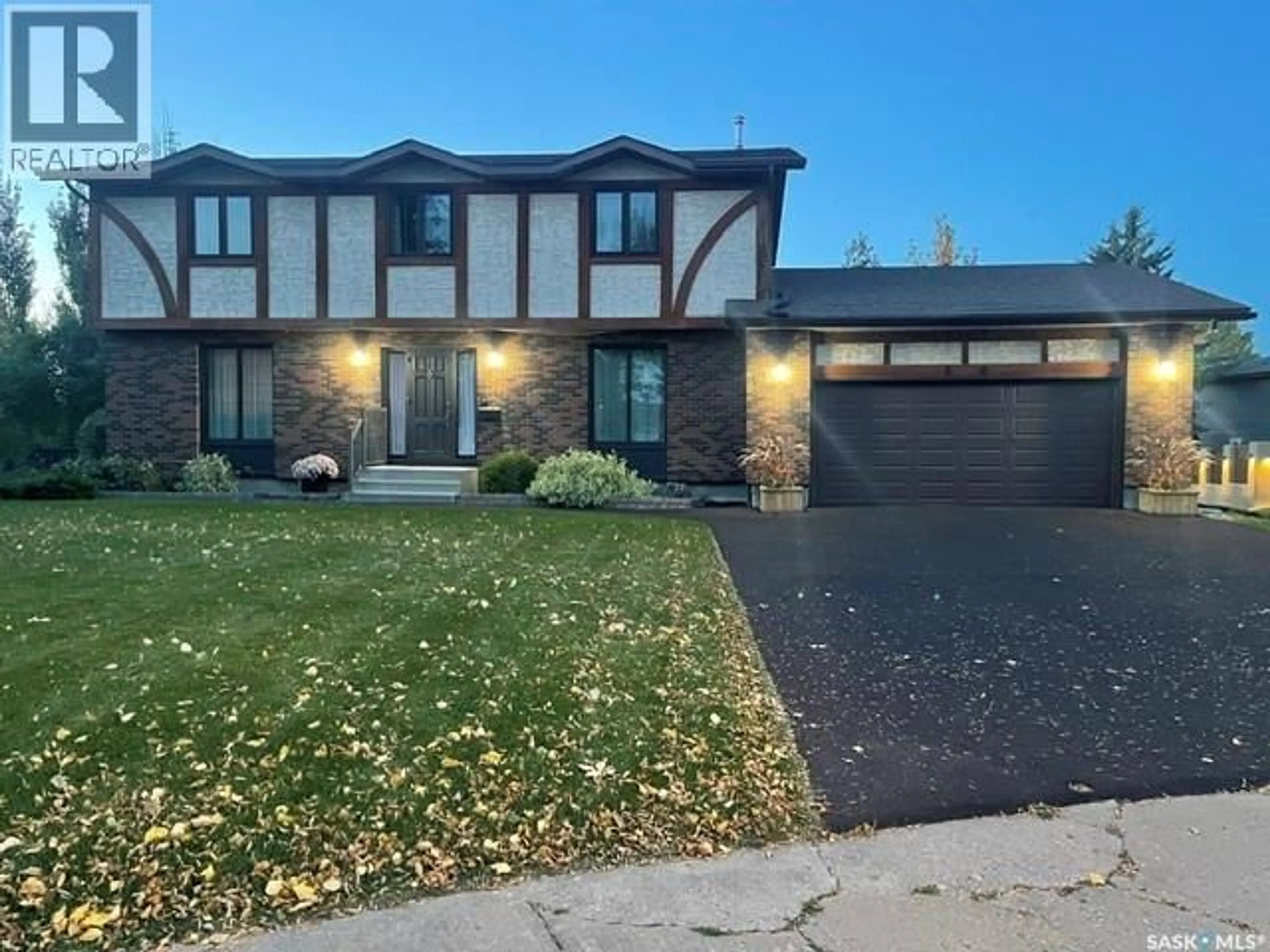 Home with vinyl exterior material, street for 830 CHESTER PLACE, Prince Albert Saskatchewan S6V6Y8