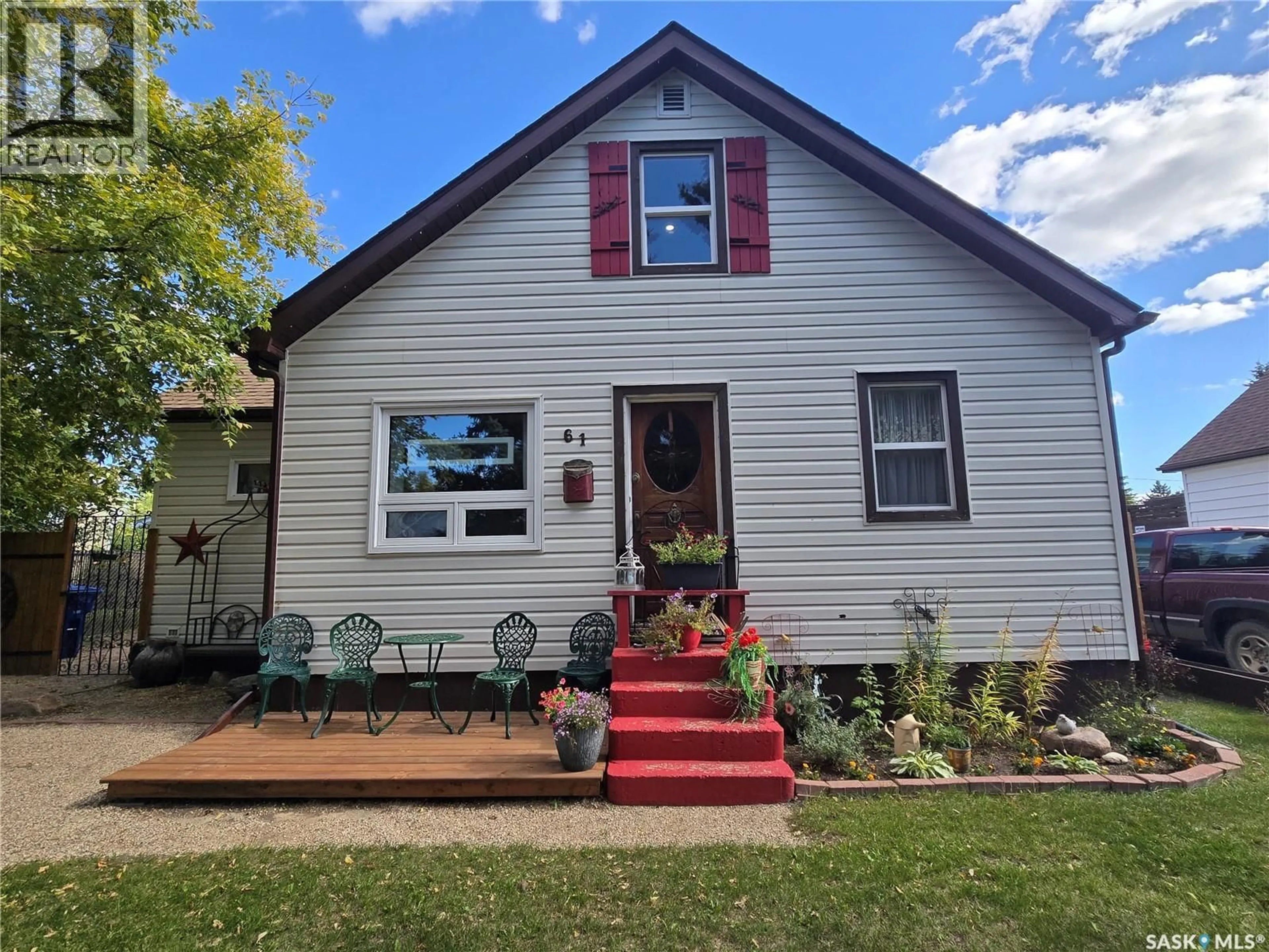 Home with vinyl exterior material, street for 61 ANTRIM STREET, Lanigan Saskatchewan S0K2M0
