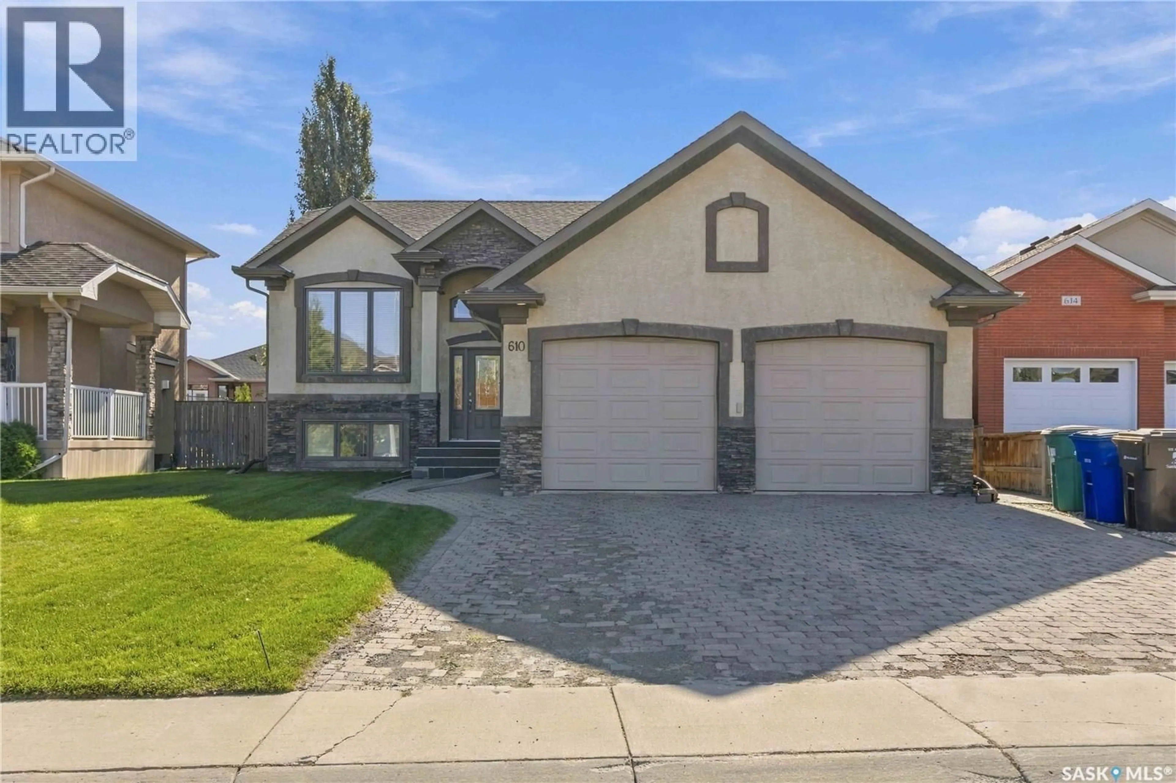 Home with vinyl exterior material, street for 610 BEECHDALE TERRACE, Saskatoon Saskatchewan S7V0A5