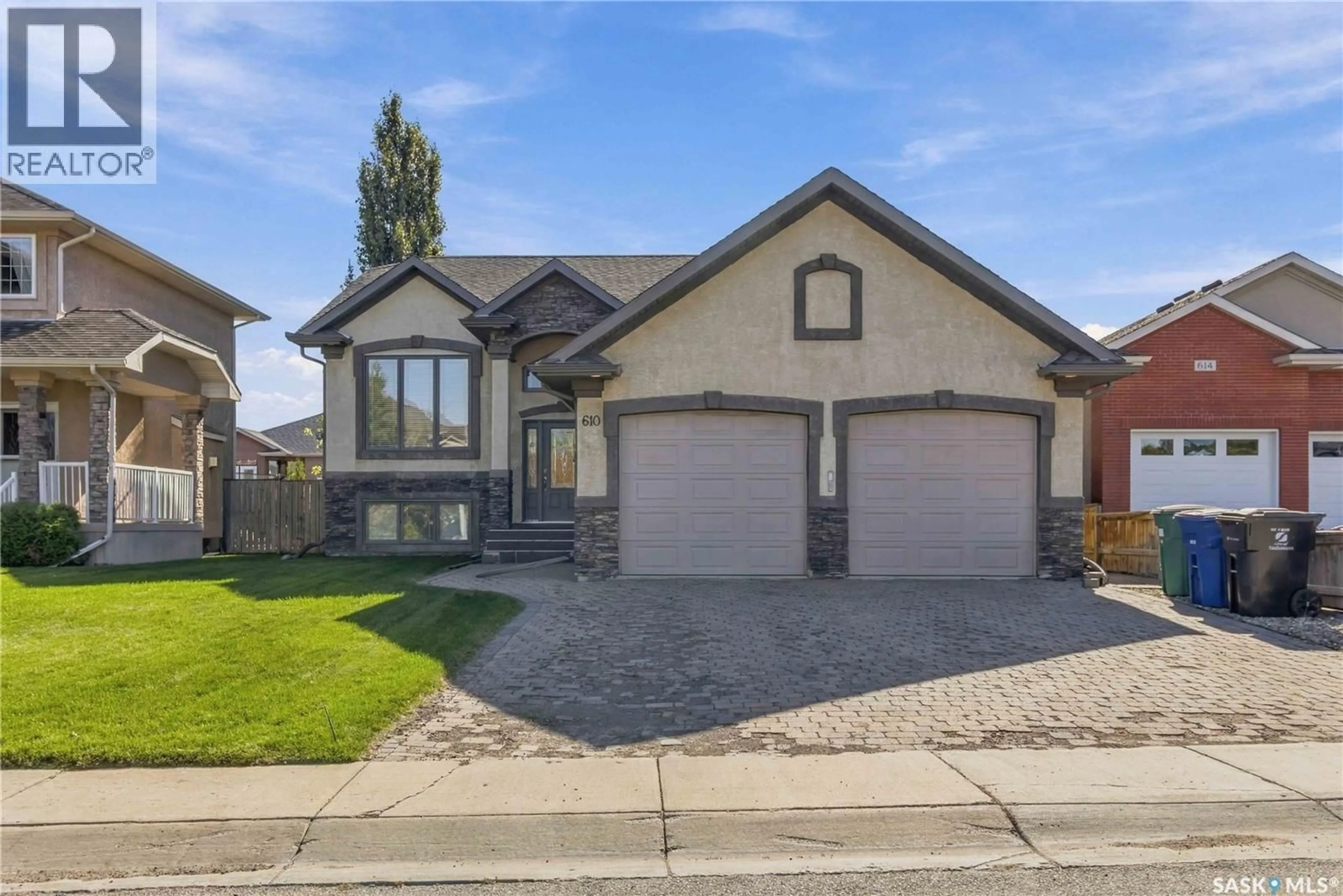 Home with brick exterior material, street for 610 BEECHDALE TERRACE, Saskatoon Saskatchewan S7V0A5