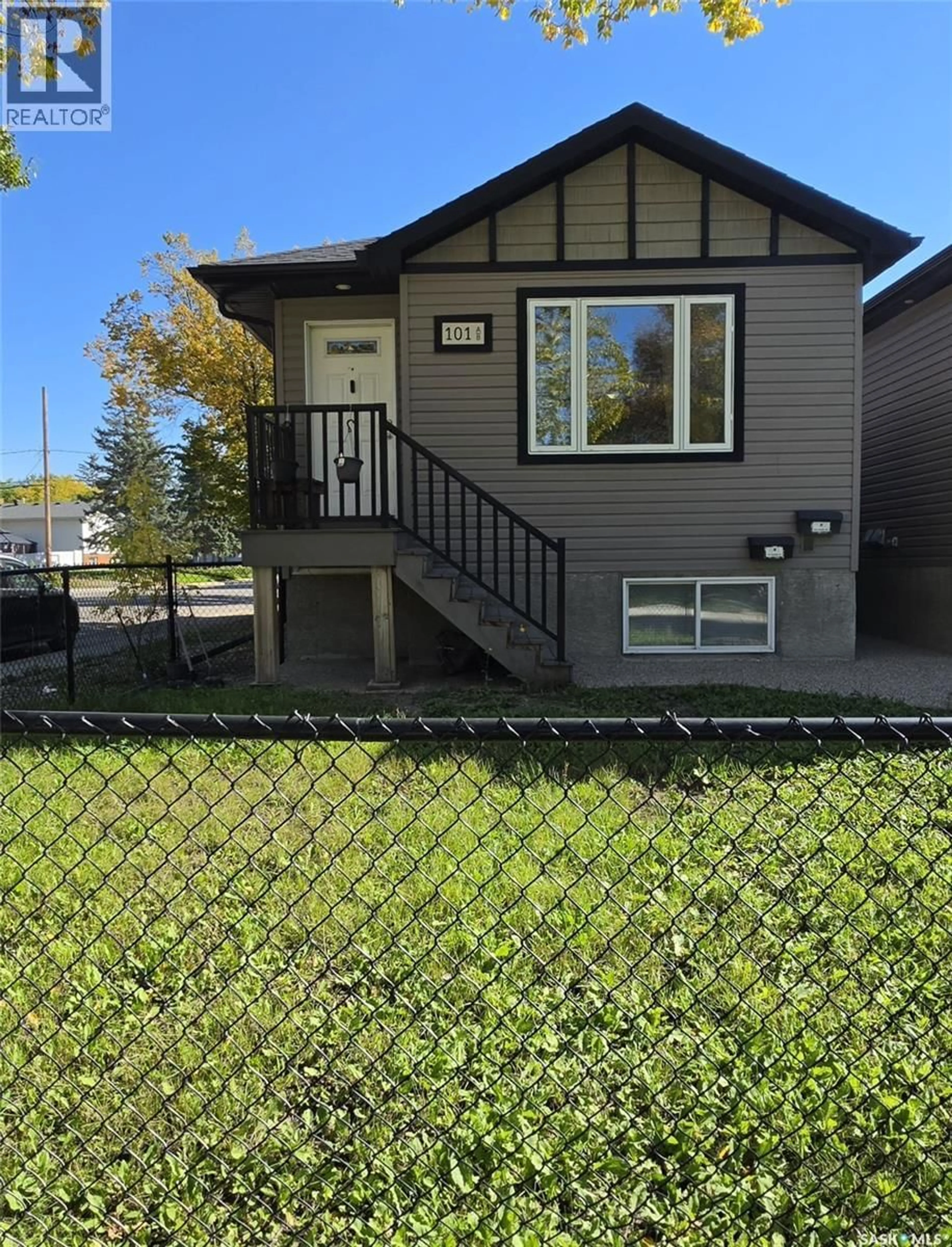 Home with vinyl exterior material, street for 101 HALIFAX STREET, Regina Saskatchewan S4R1S6