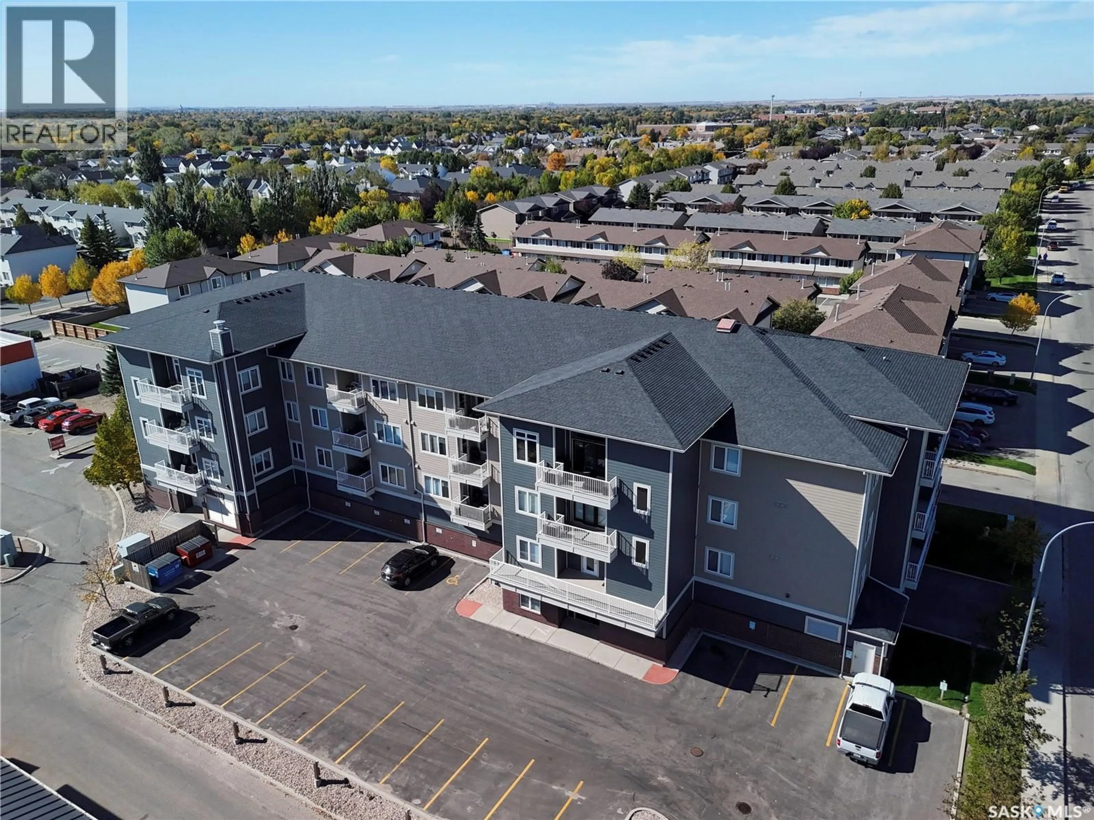 A pic from outside/outdoor area/front of a property/back of a property/a pic from drone, building for 209 - 4501 CHILD AVENUE, Regina Saskatchewan S4X0L7