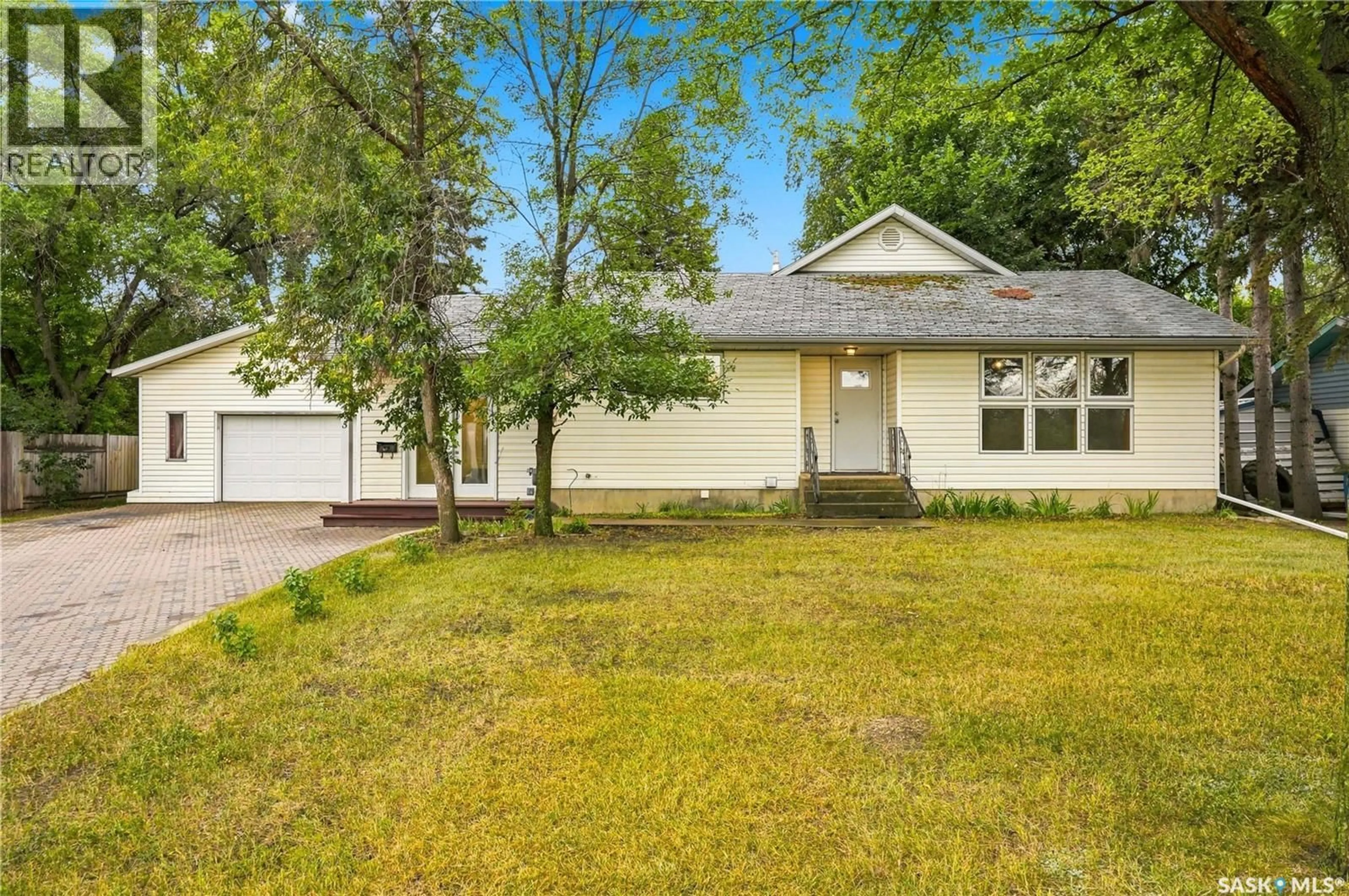 Home with vinyl exterior material, street for 3445 11TH STREET, Saskatoon Saskatchewan S7M1K4