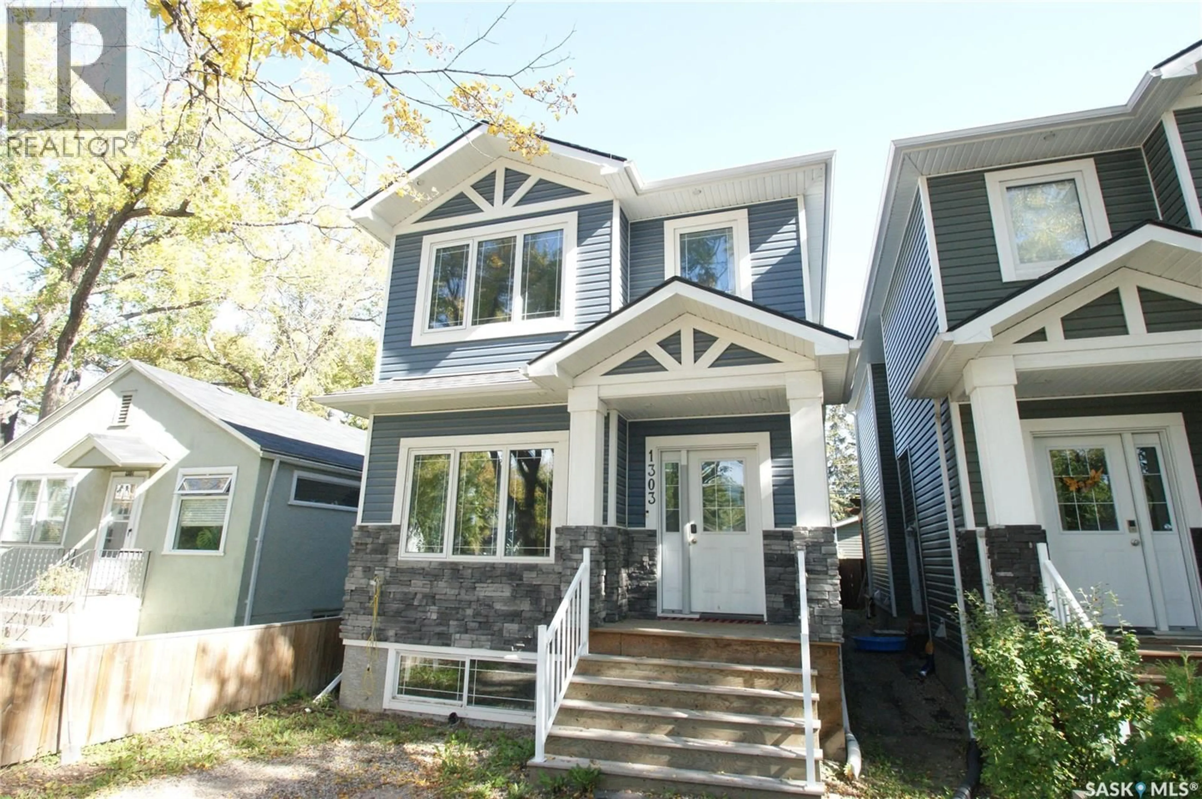 Home with vinyl exterior material, street for 1303A BROADWAY AVENUE, Saskatoon Saskatchewan S7H2A5