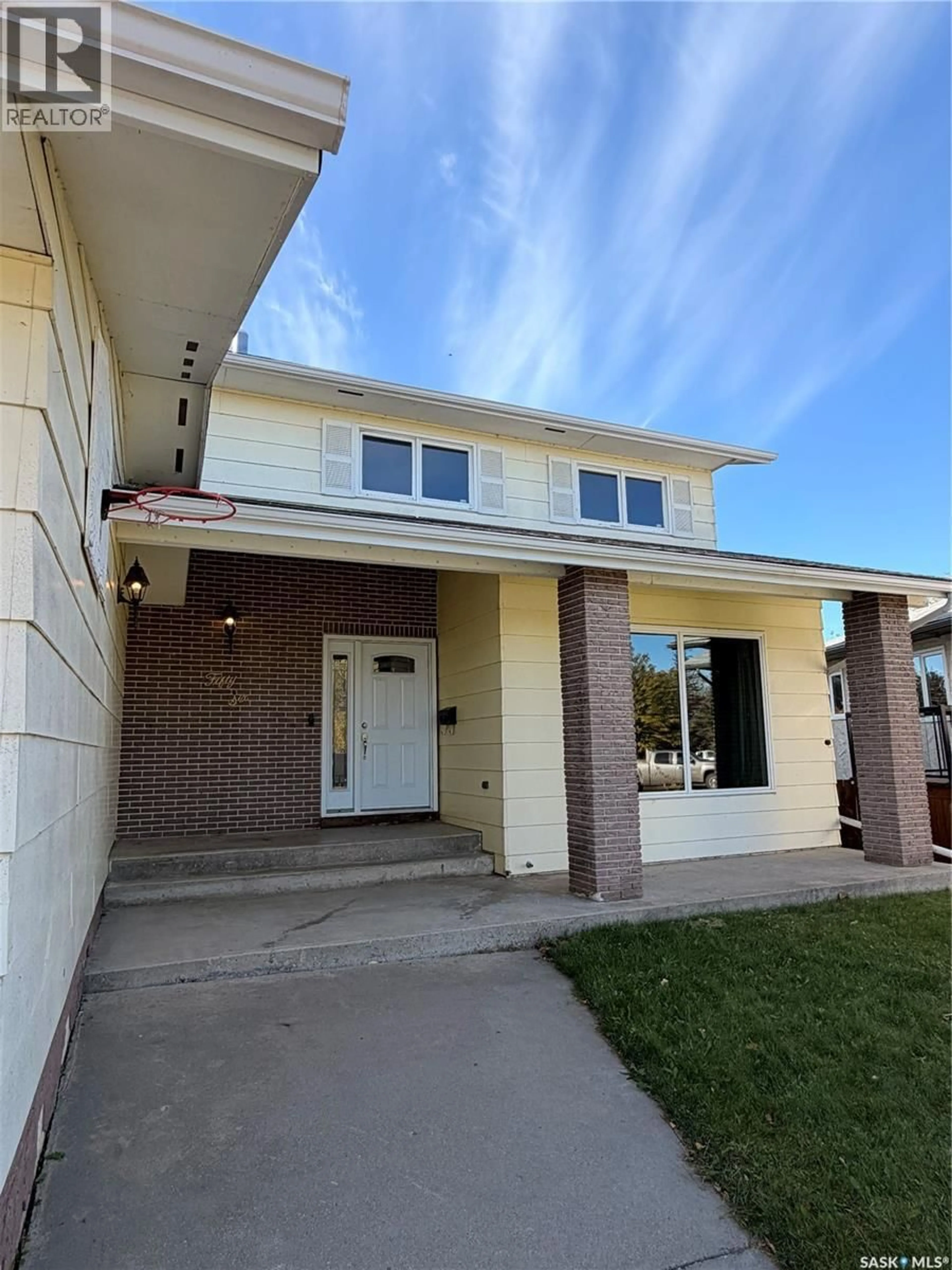 Home with brick exterior material, street for 56 DUNFIELD CRESCENT, Meadow Lake Saskatchewan S9X1E3