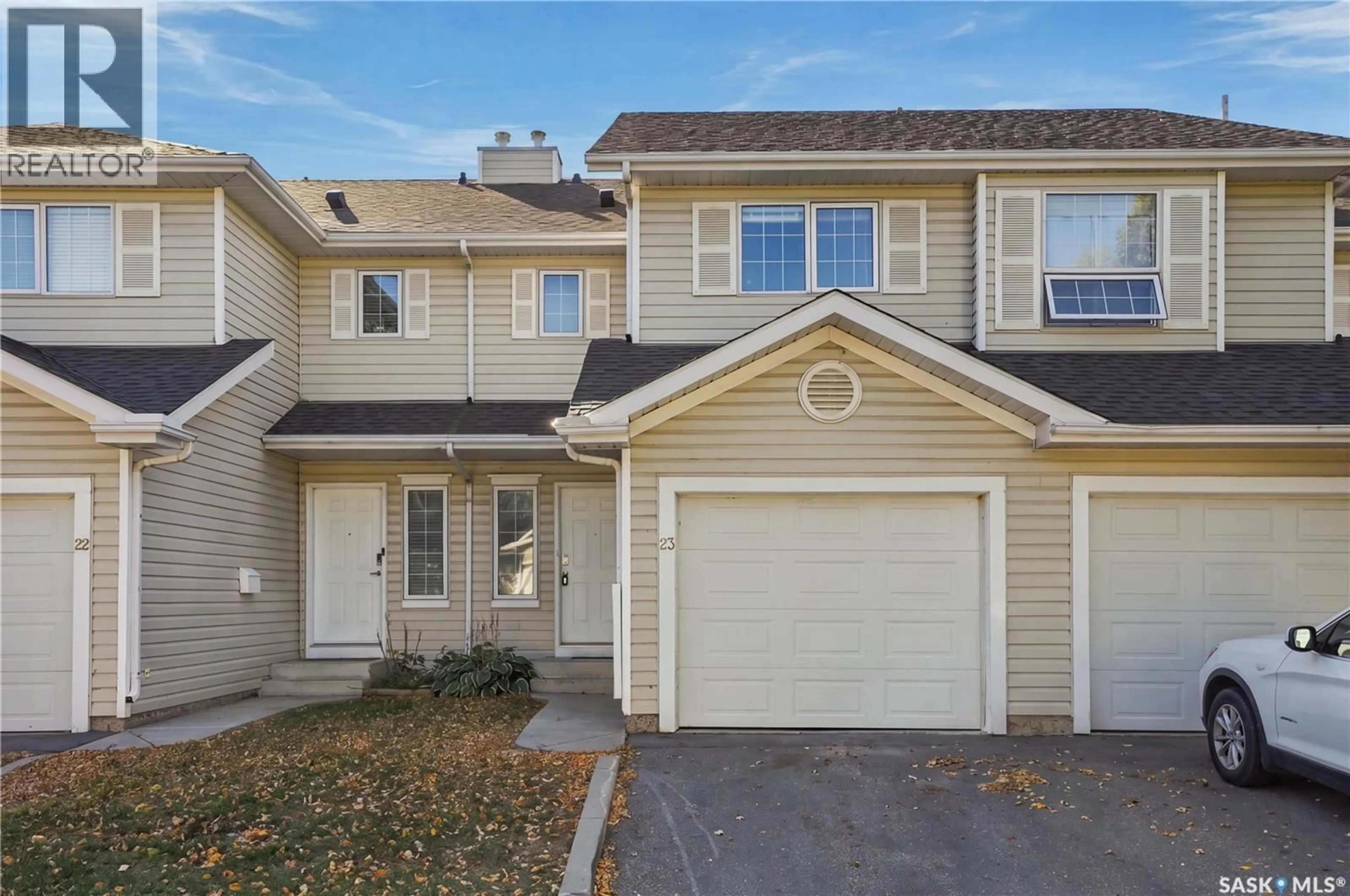 Home with vinyl exterior material, street for 23 110 KEEVIL CRESCENT, Saskatoon Saskatchewan S7N4N8