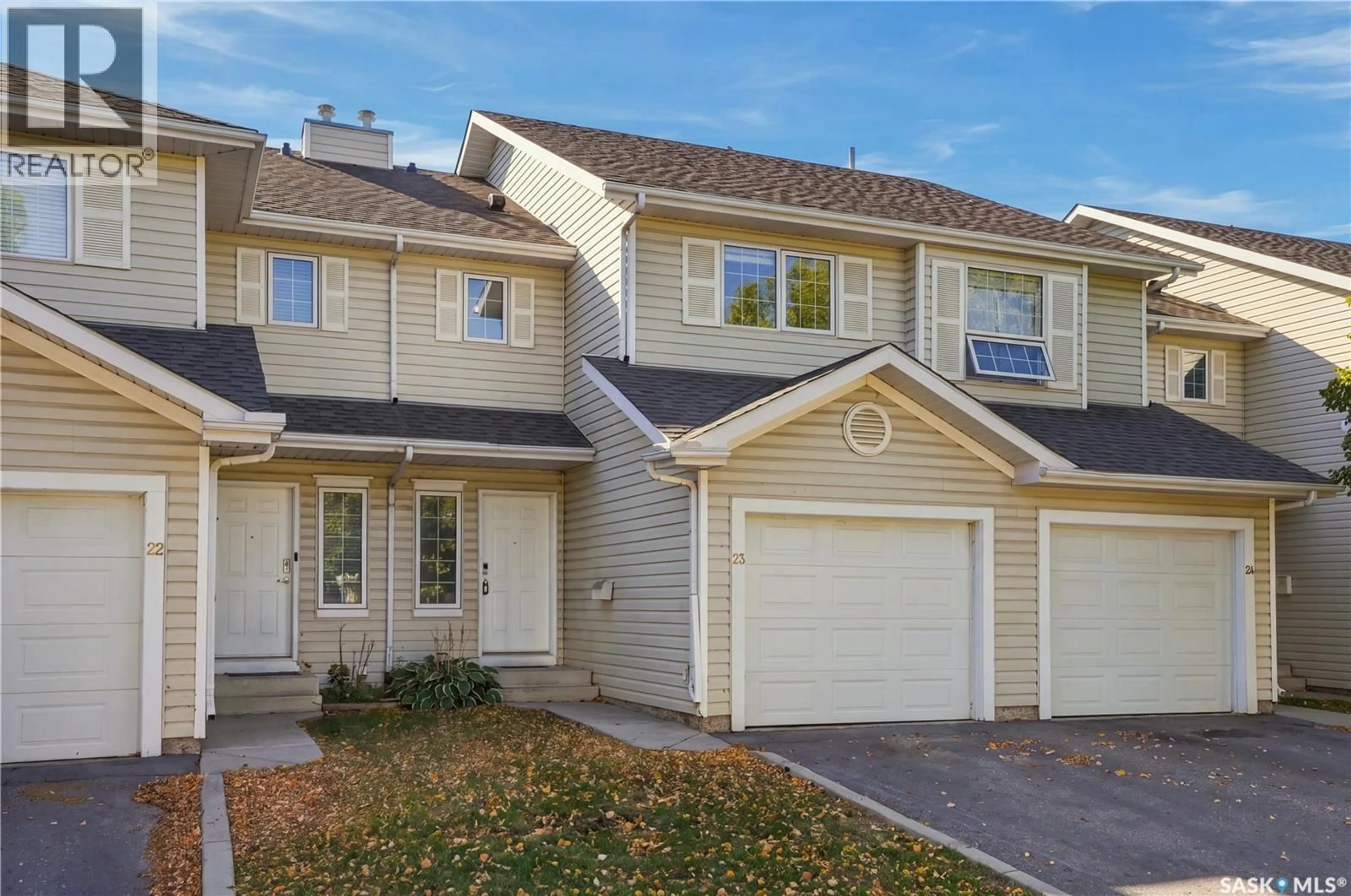 Home with vinyl exterior material, street for 23 110 KEEVIL CRESCENT, Saskatoon Saskatchewan S7N4N8
