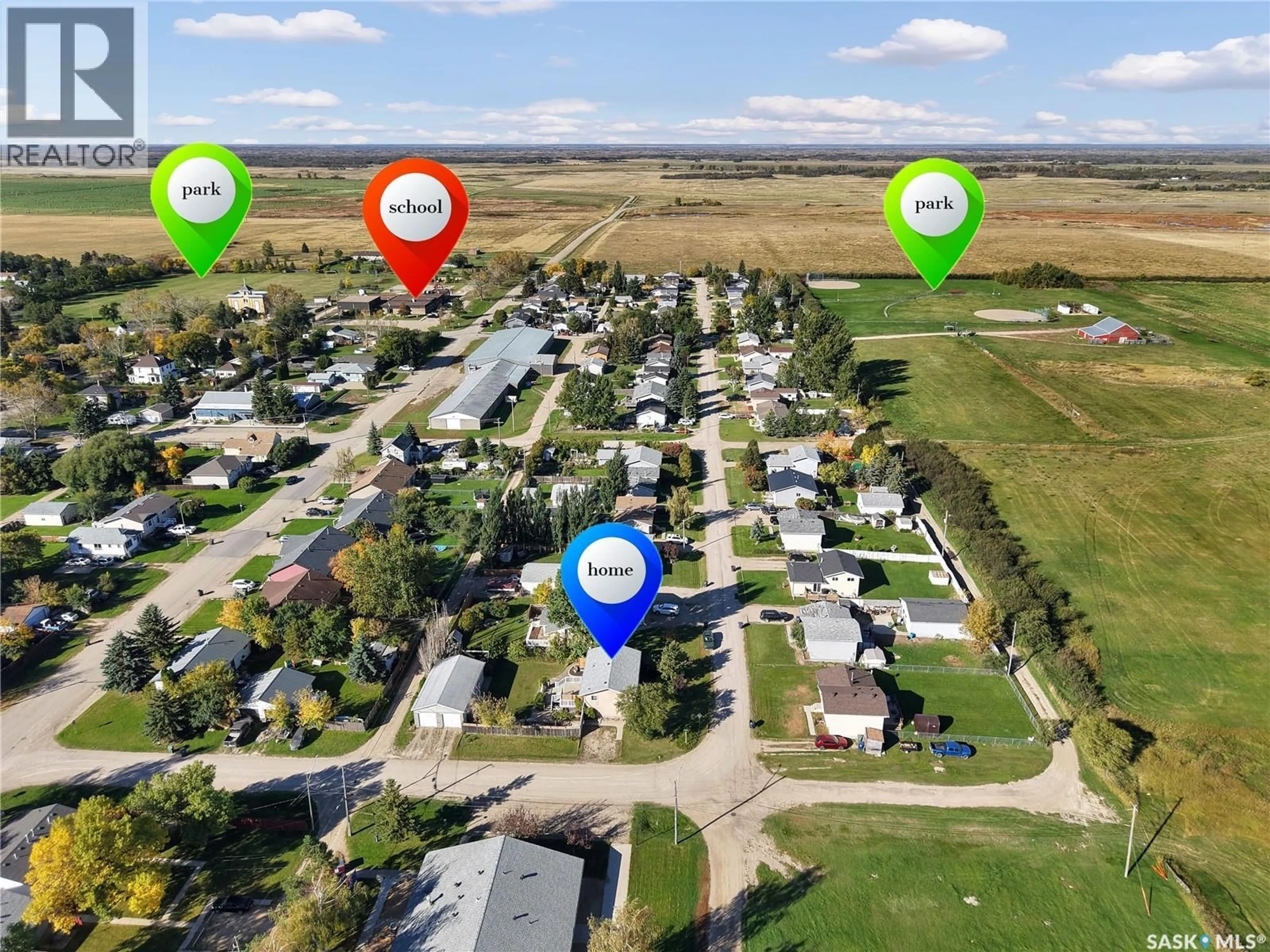 A pic from outside/outdoor area/front of a property/back of a property/a pic from drone, street for 310 4TH STREET, Dundurn Saskatchewan S0K1K0