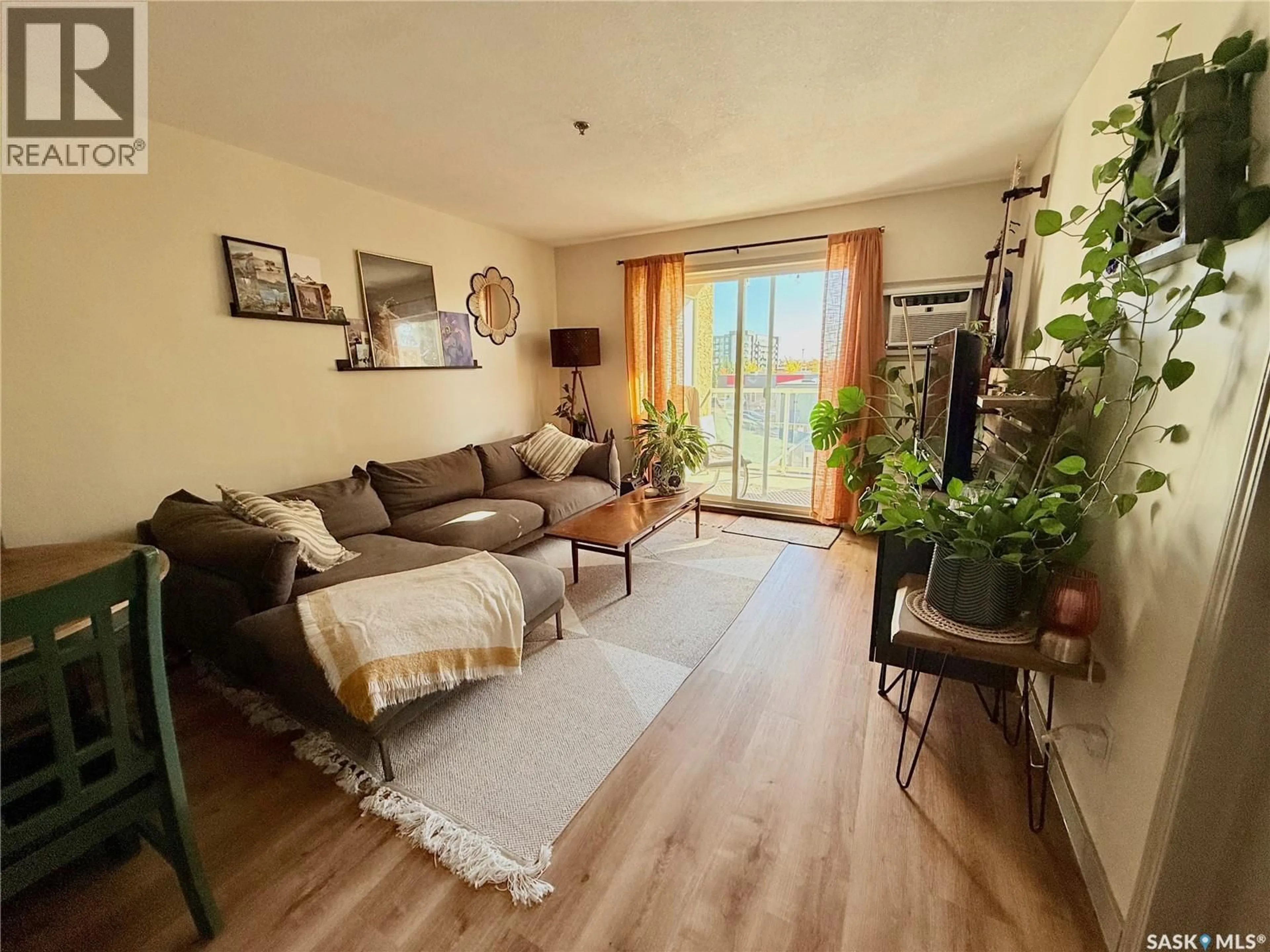Living room with furniture, unknown for 311 215 LOWE ROAD, Saskatoon Saskatchewan S7S1N1
